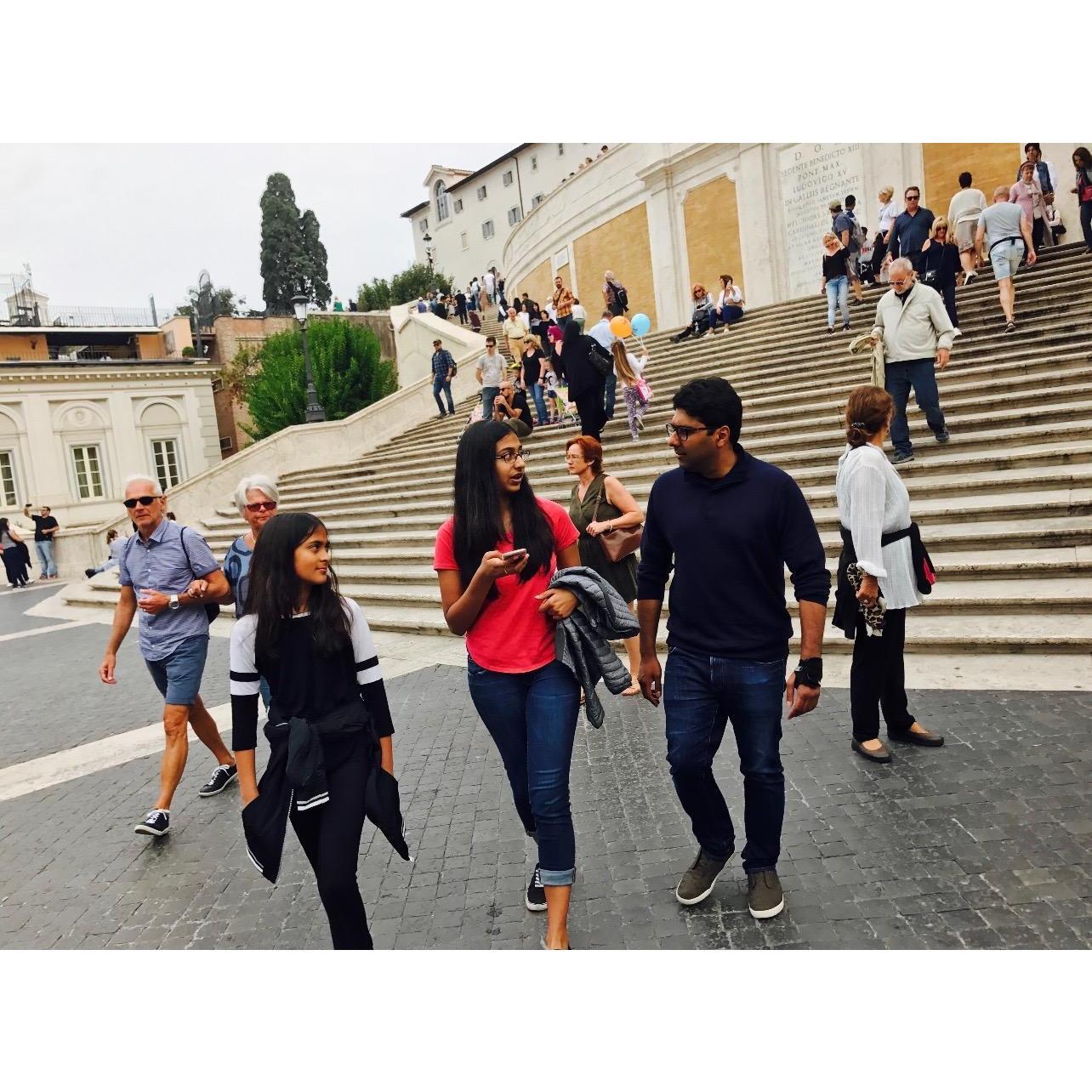 Amar tries to impart a little bit of wisdom to his nieces while walking around Rome