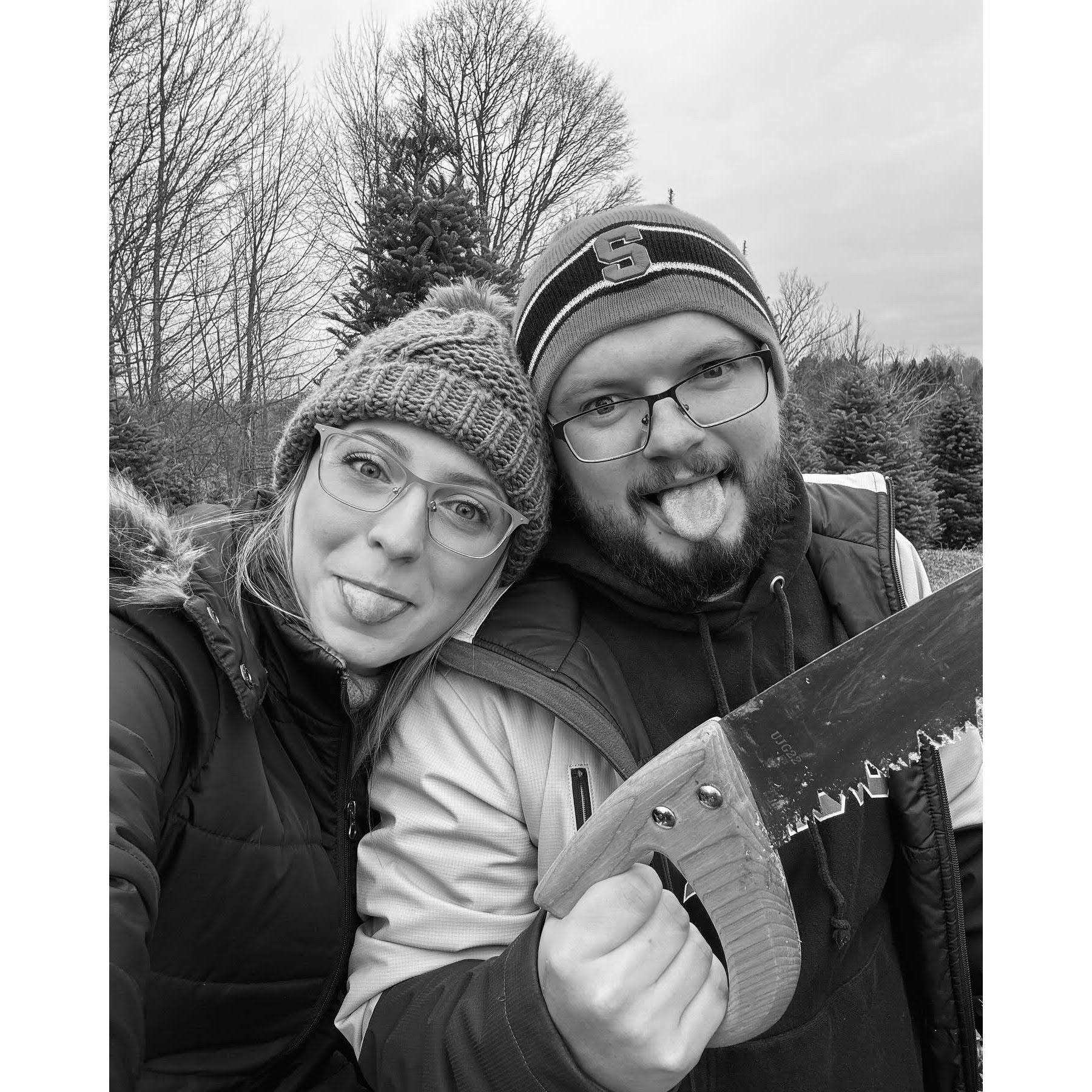 Cutting down our Christmas tree for our first Christmas in our first house.