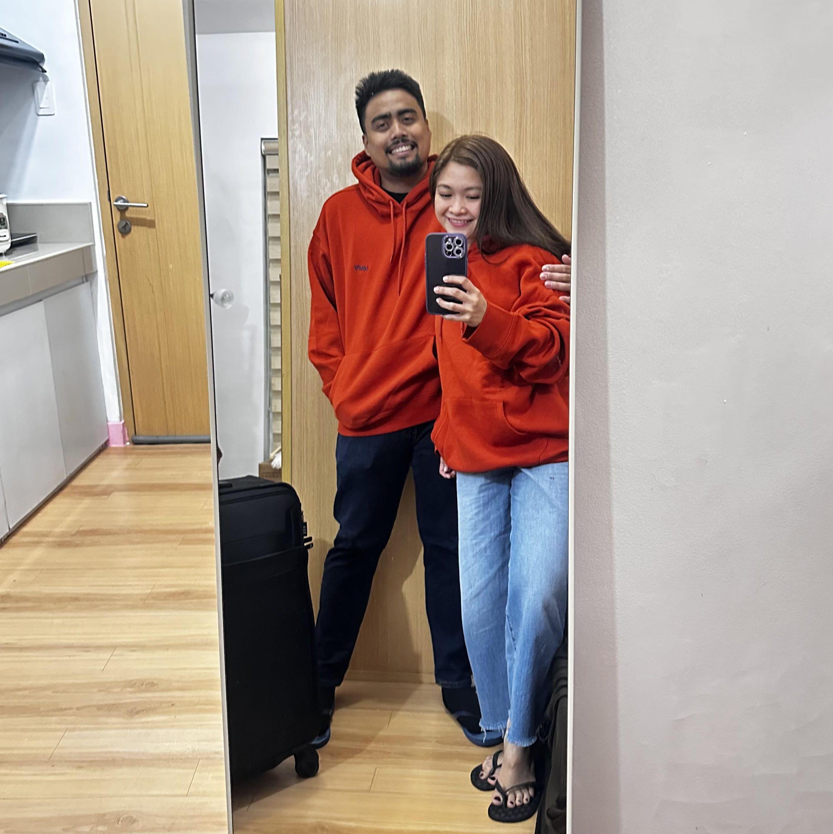 Here we are in our matching 'couple's jacket' from Mervin's mom, getting ready for a trip! These cozy jackets brought us both warmth and some serious couple style as we set off on our adventure!