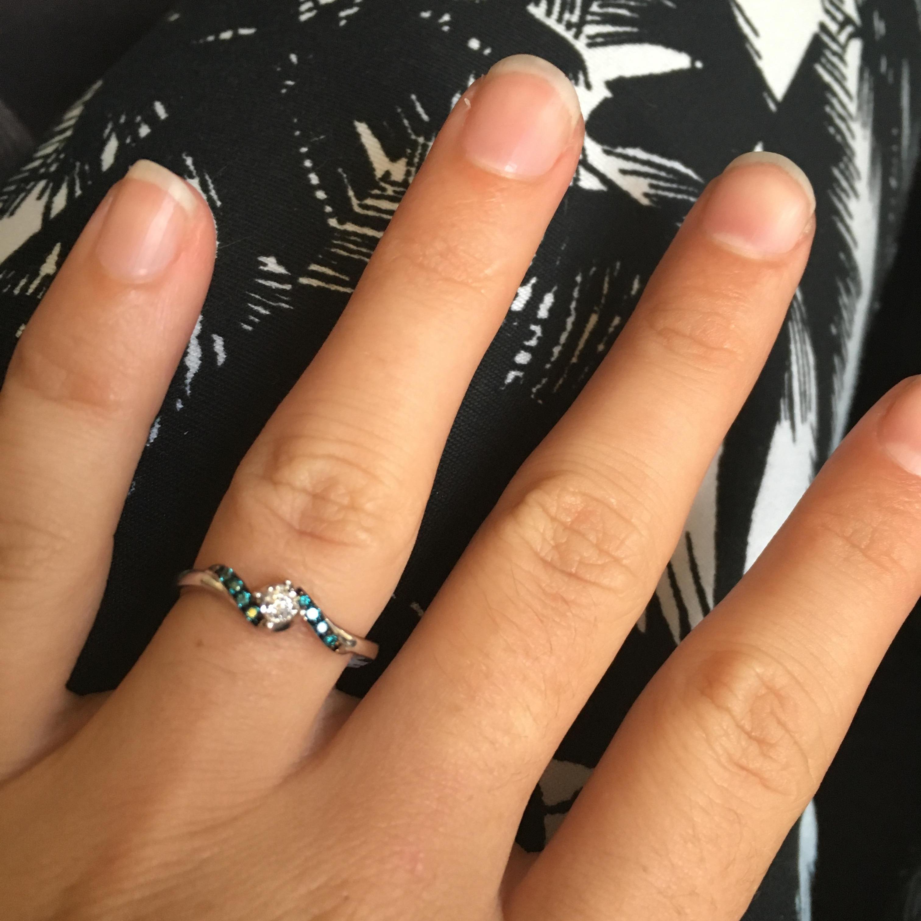 Taken the morning after he proposed while on the plane headed to the mainland. Isn't it beautiful???