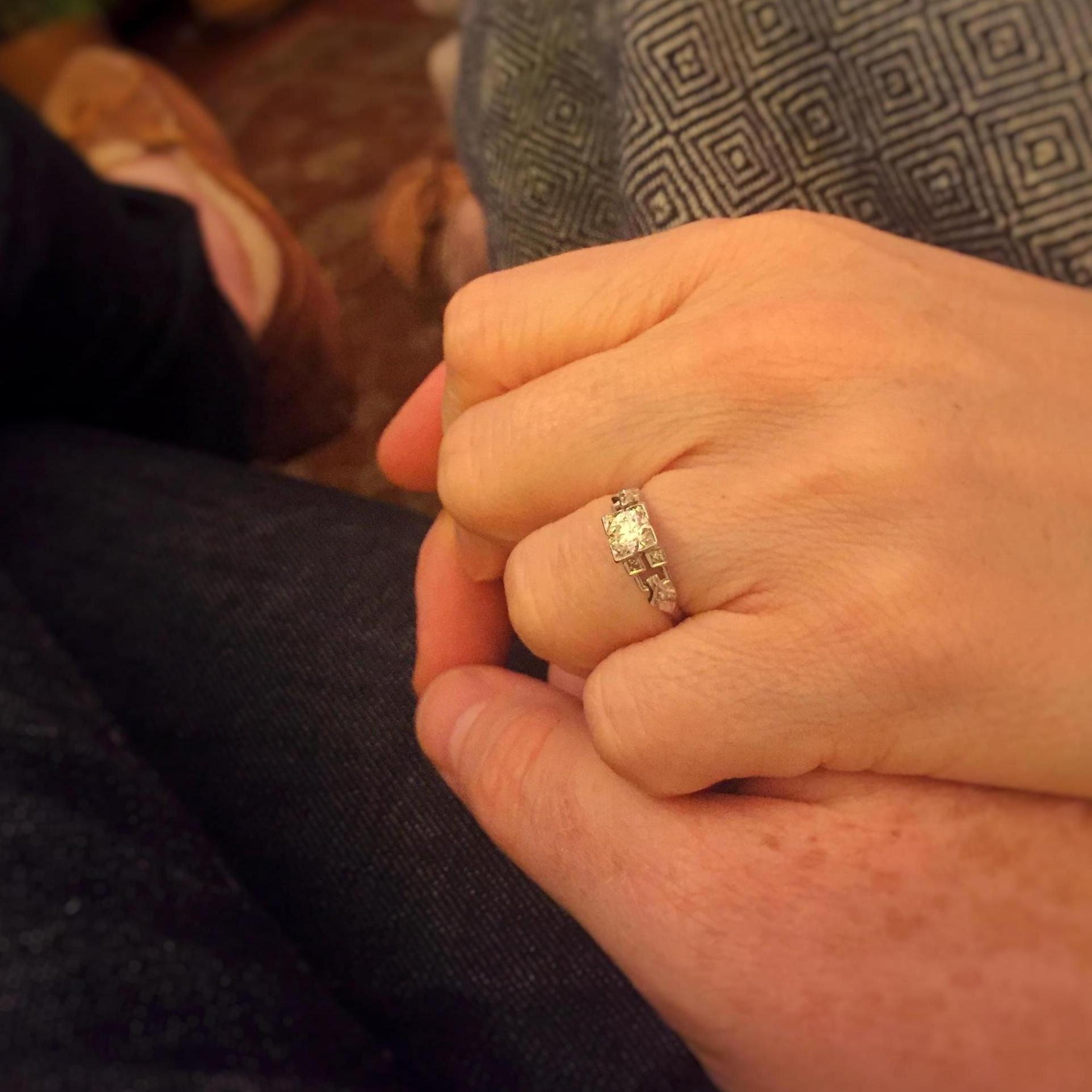 Molly made it "easier" on Chris by picking out a selection of rings she liked. Out of those, he picked this beautiful Art Deco era vintage ring that she loves.