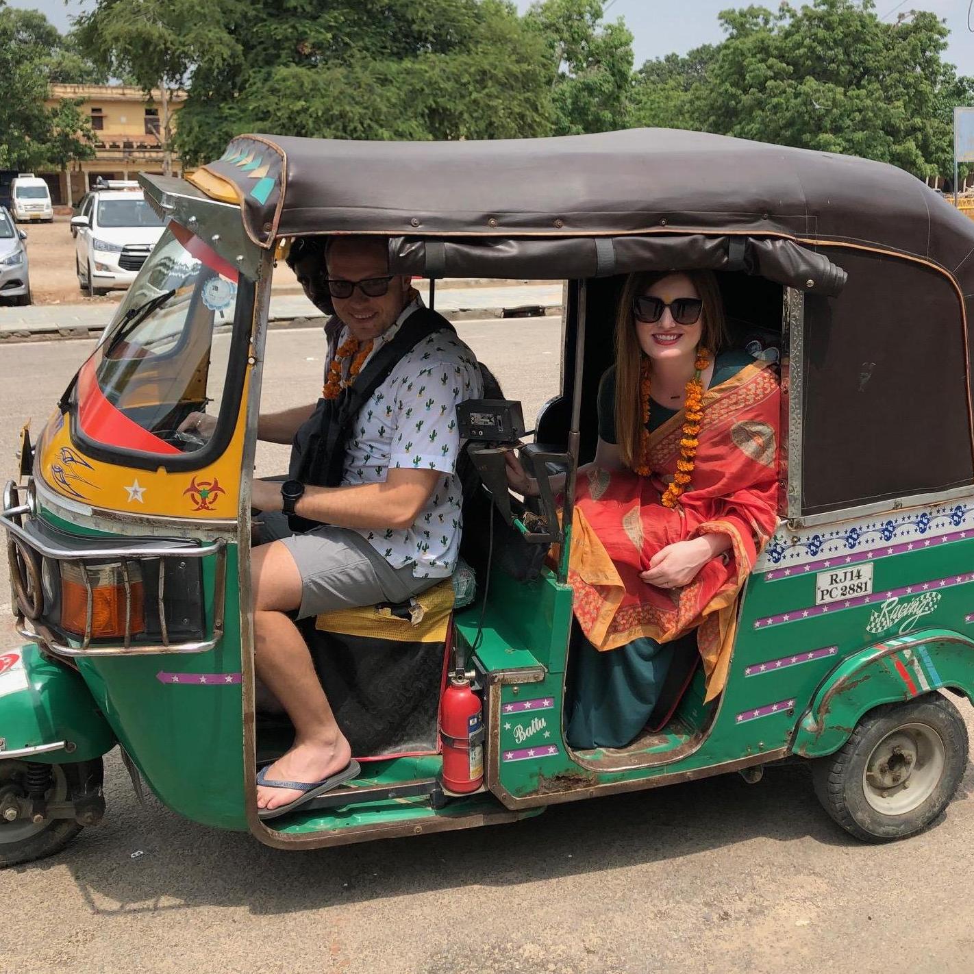 Stephen driving a tuk tuk in India