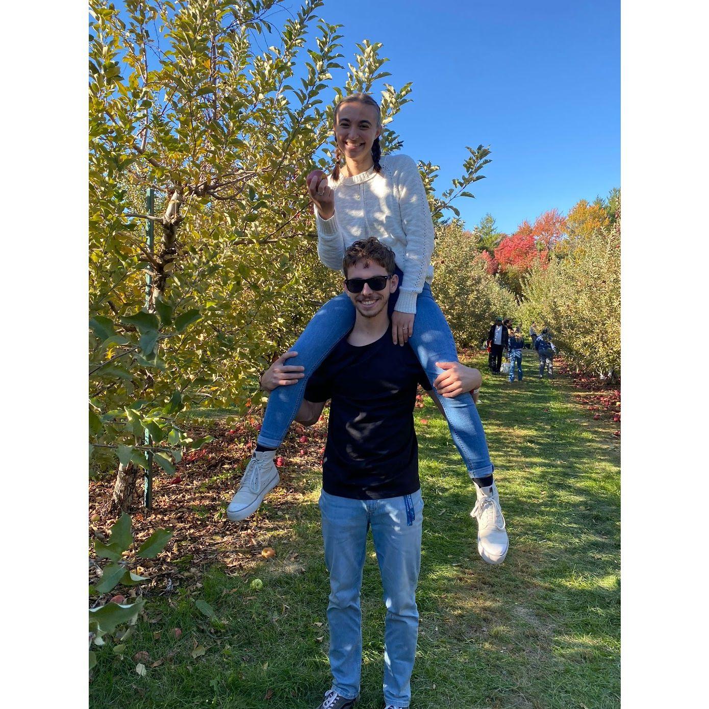 On the day of our engagement, we were visiting friends. We got to spend the afternoon apple picking and celebrating with them. Since fall is L's favorite season, she loved this!