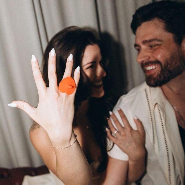 Fun fact - the groom first proposed to the bride with a ring pop on a beautiful April afternoon