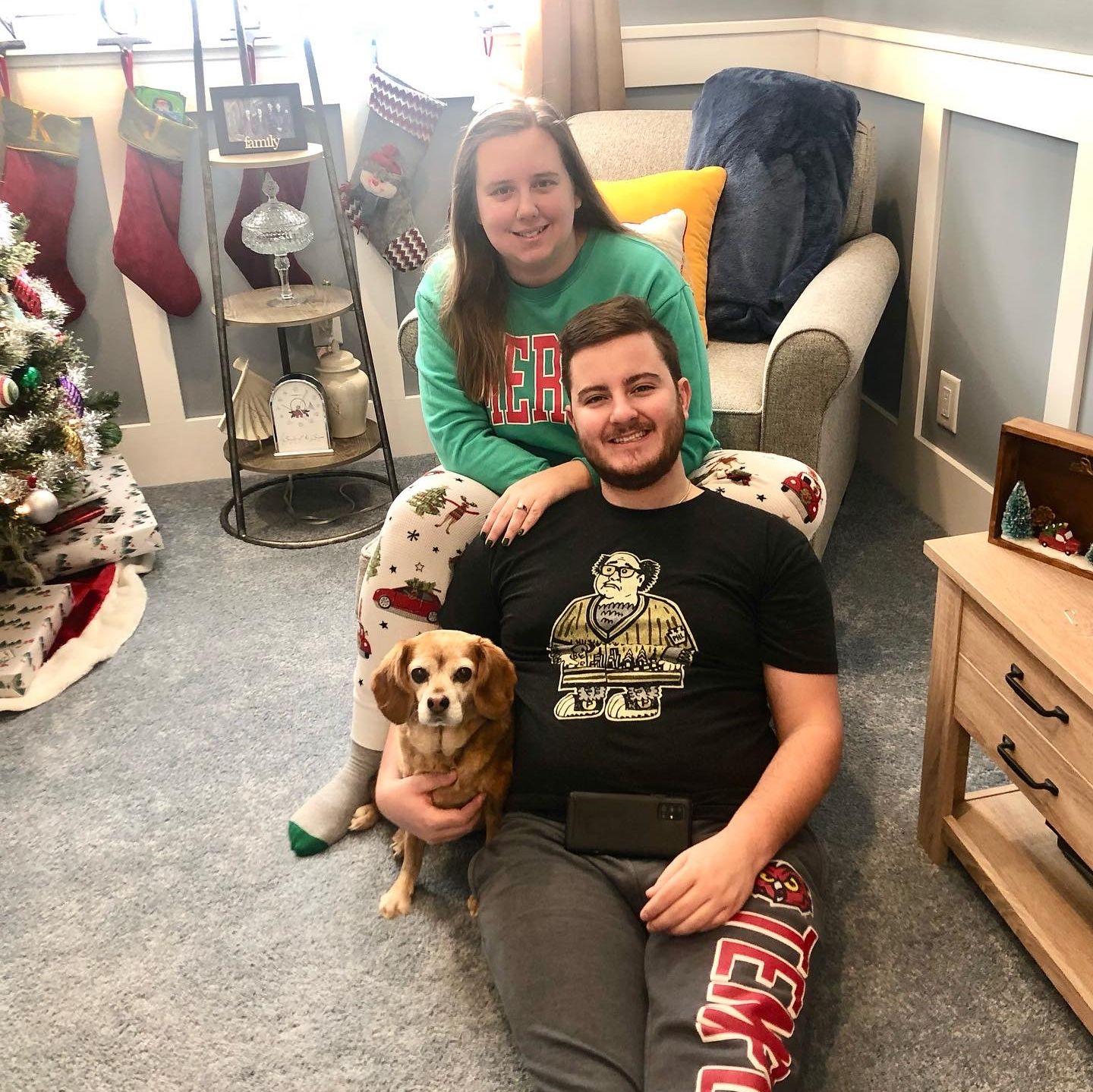 Getting Bailey's blessing on our first Christmas after getting engaged.