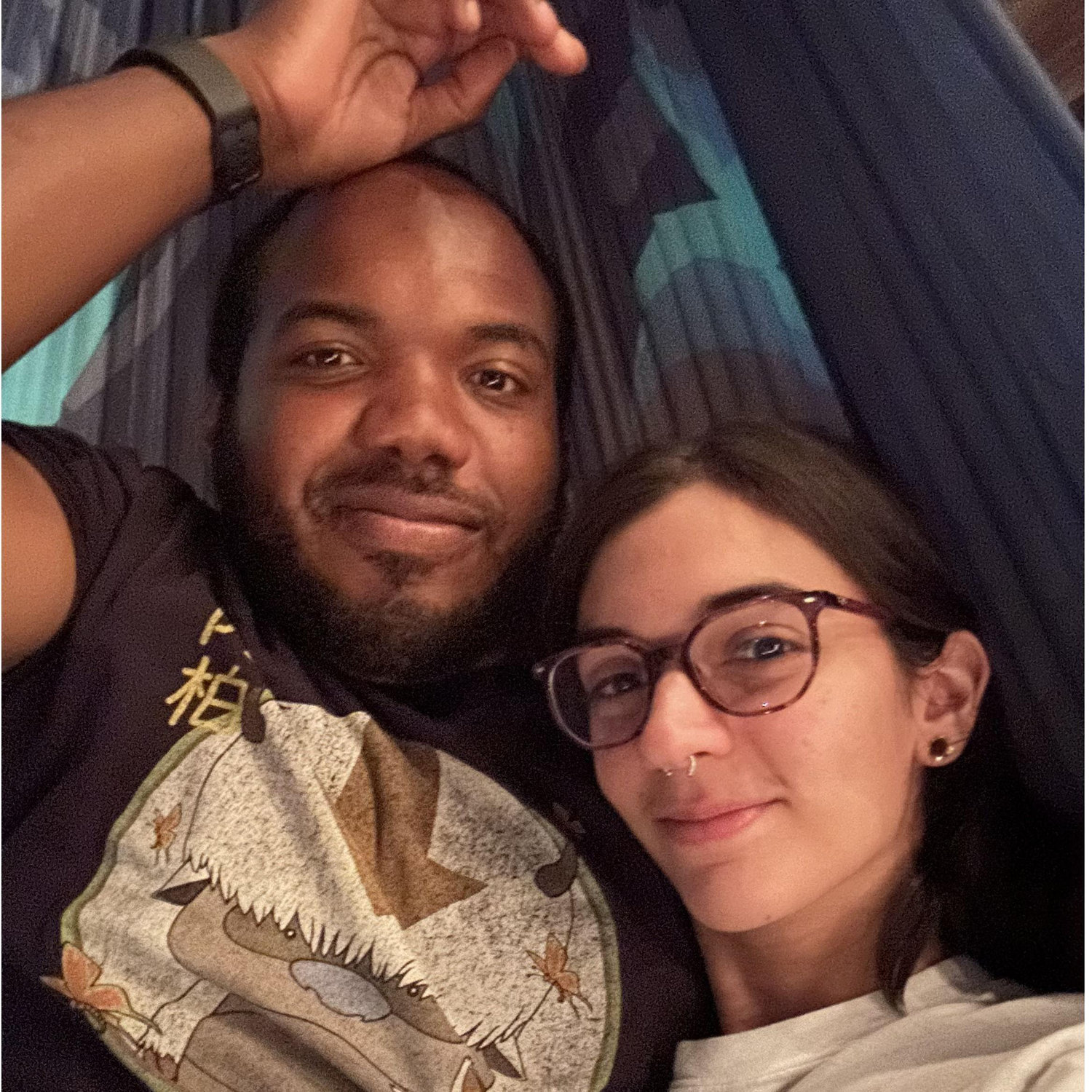 A photo in our backyard hammock, one of our favorite places.