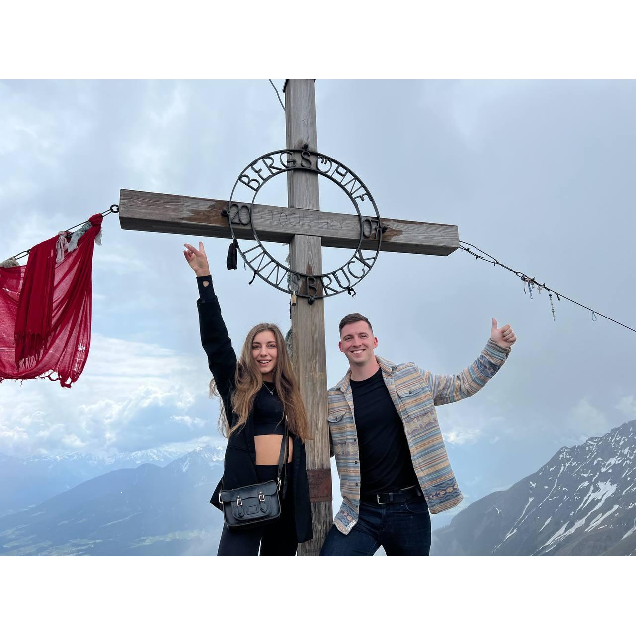 May 28, 2023 On top of Bergsohne Mountain in the Alps, Innsbruck, Austria, soaking in breathtaking views and celebrating a moment of awe and adventure together.