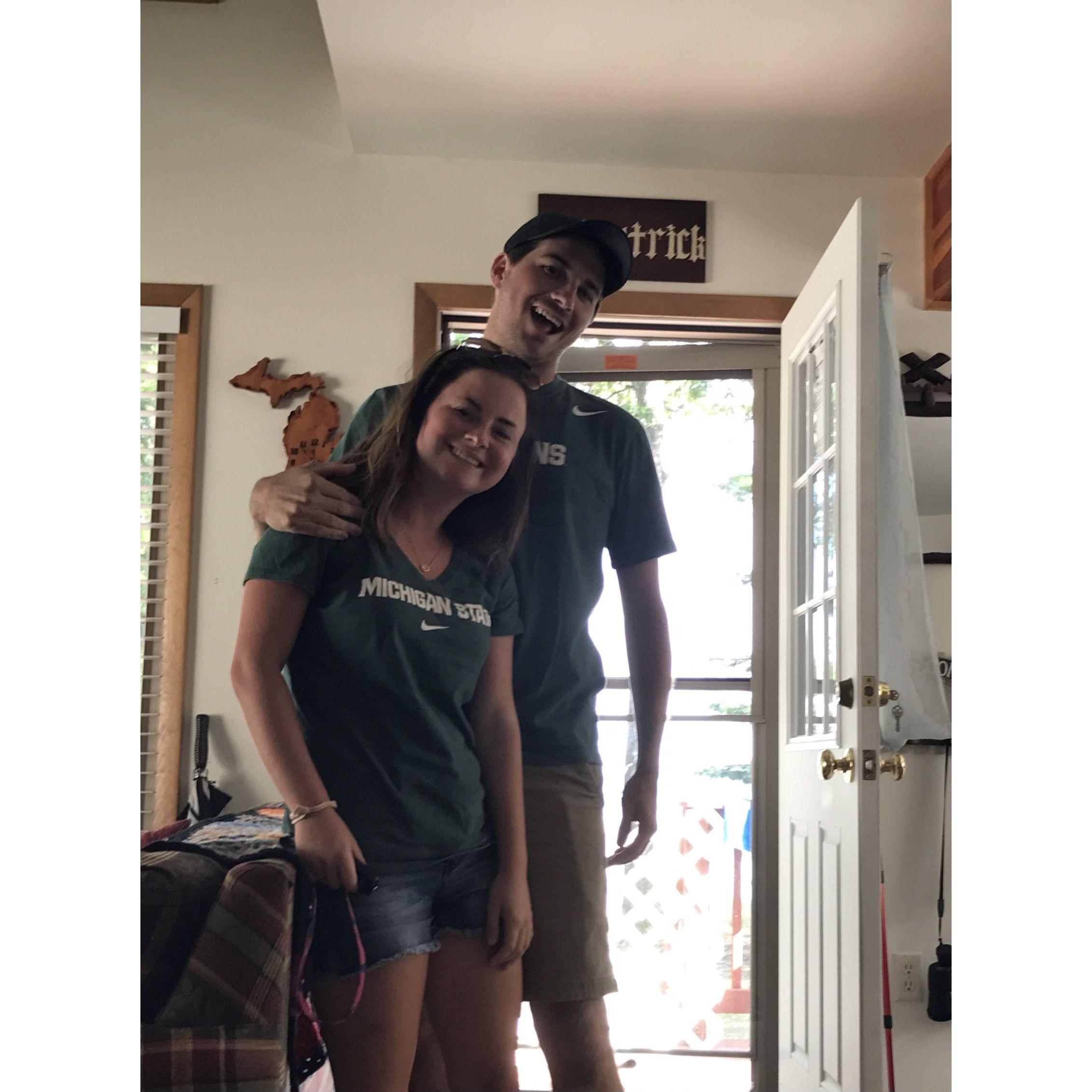 Our first photo ever taken together in our favorite part of Michigan (Higgins Lake)