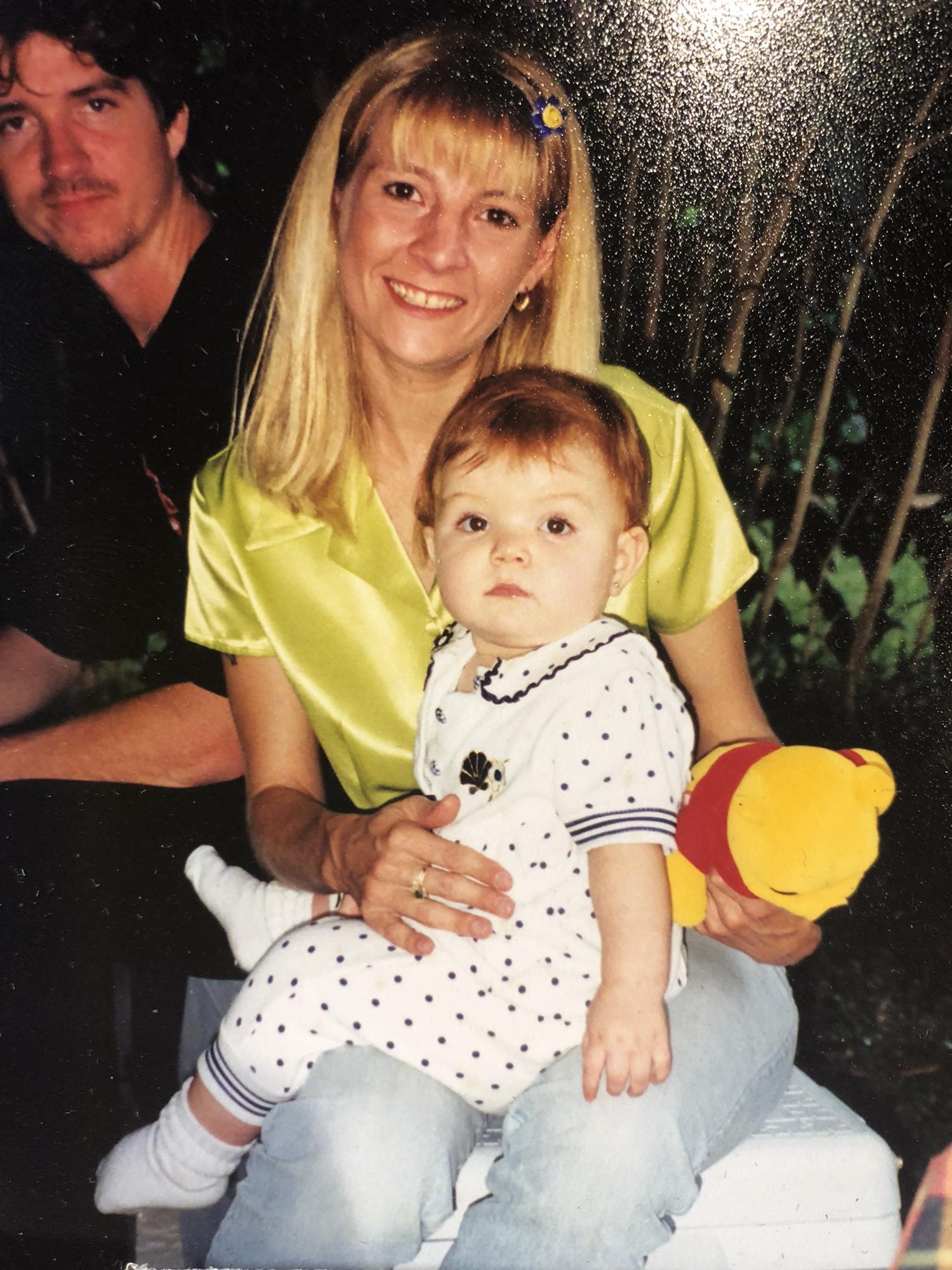 Lea with her mom and dad