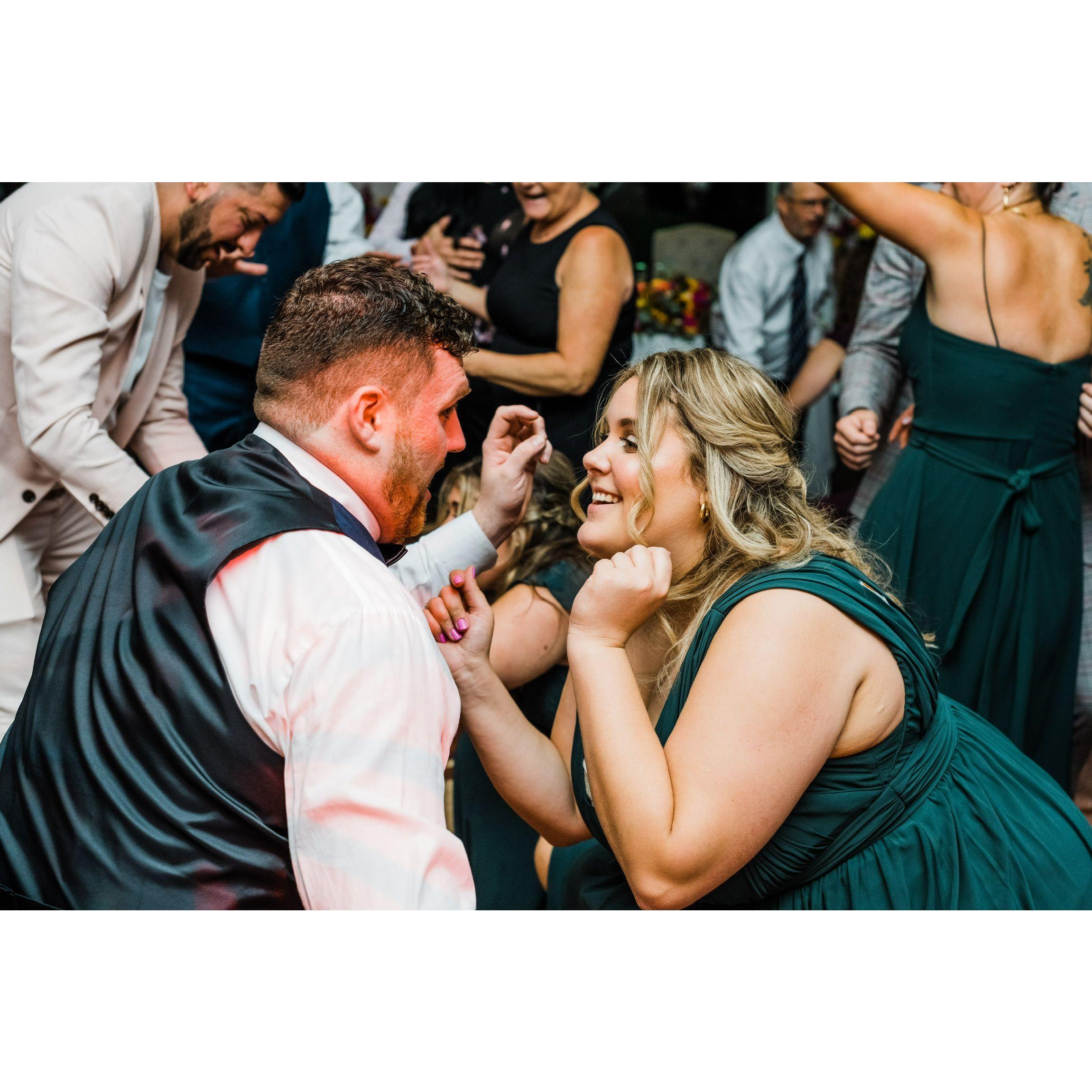 Dancing at our best friend's wedding