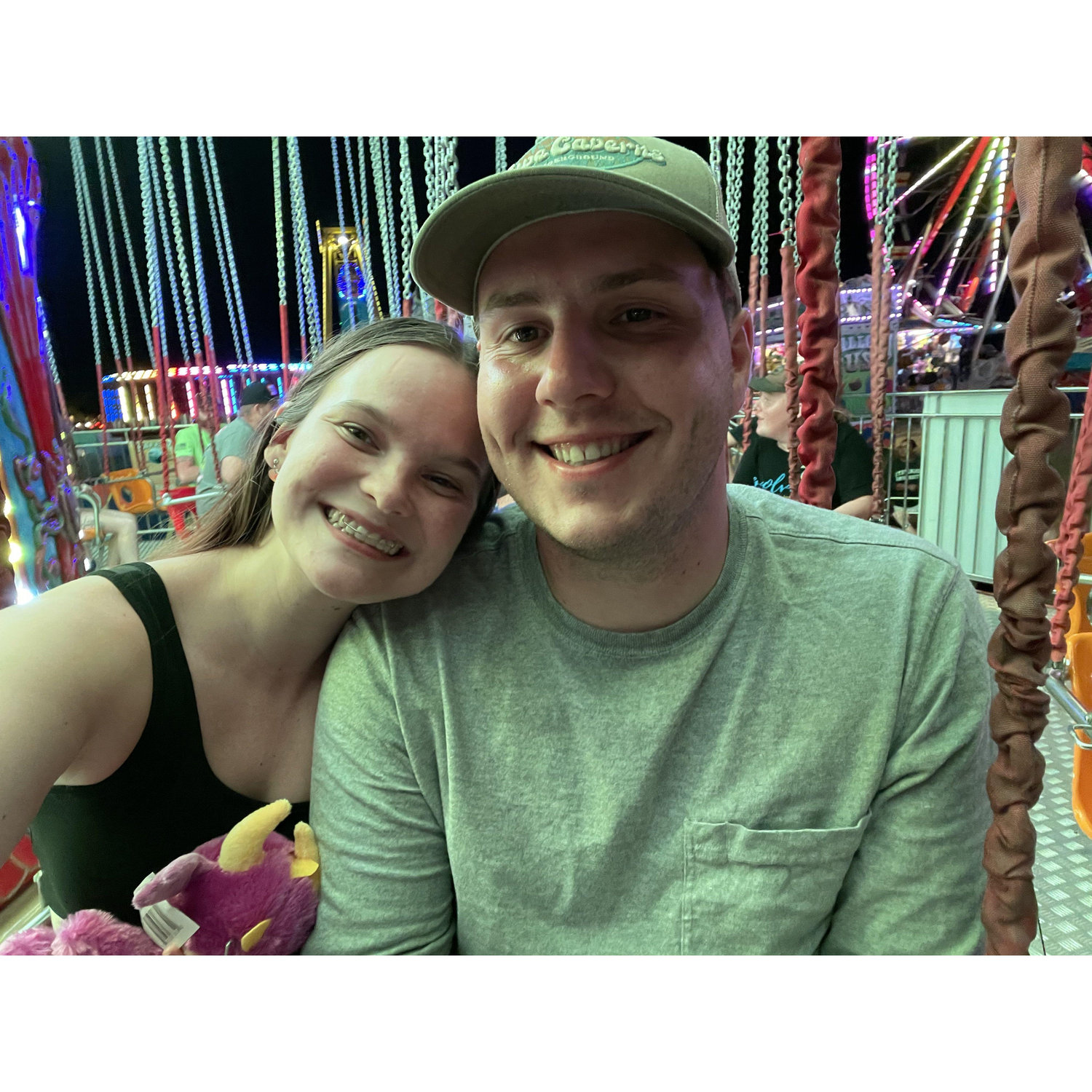 Us on the swings at the state fair.