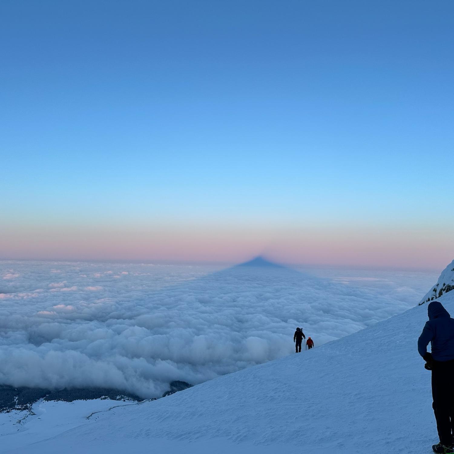 Admiring Mt. Hood's shadow, a result of the perspective effect