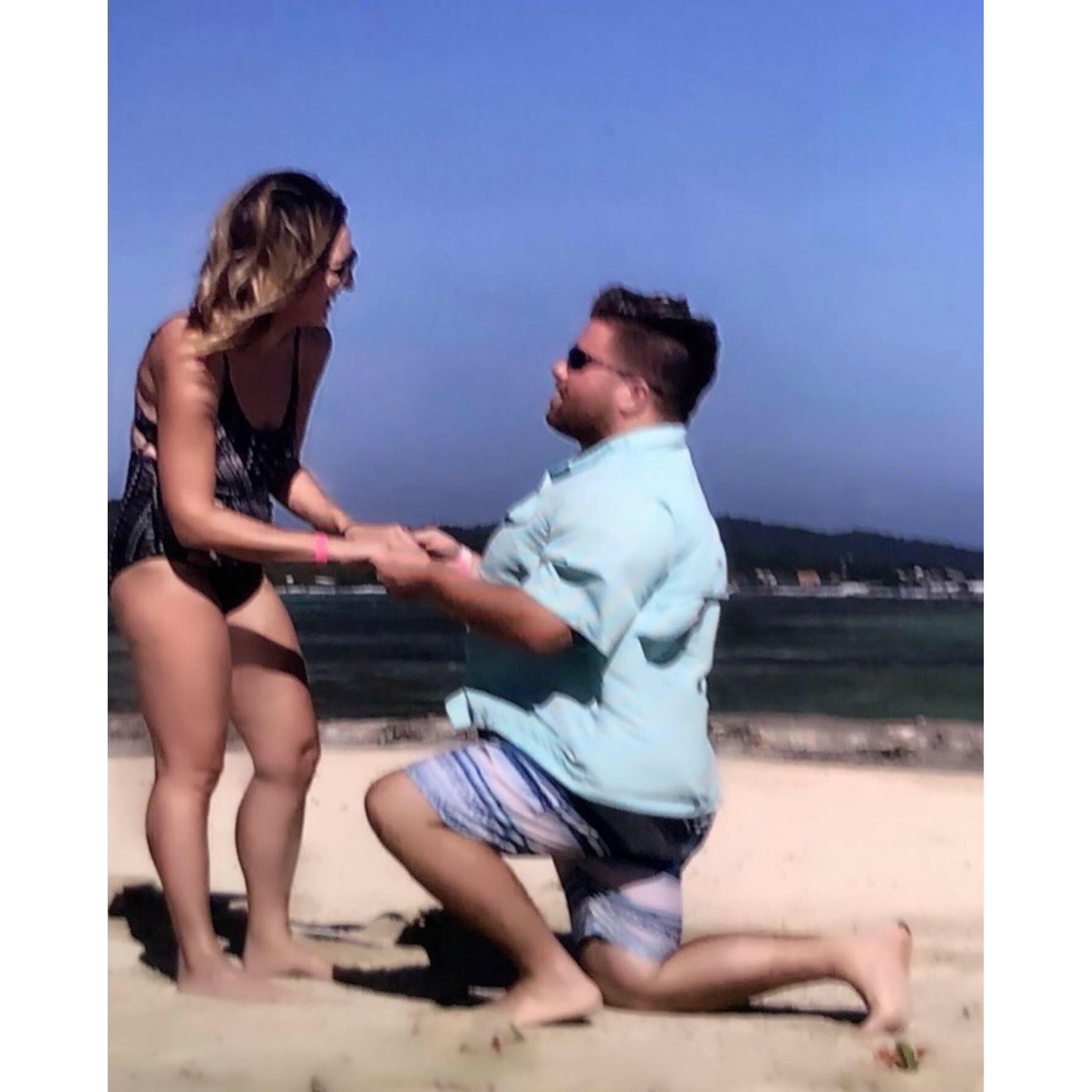 Fake proposal in the sand lol