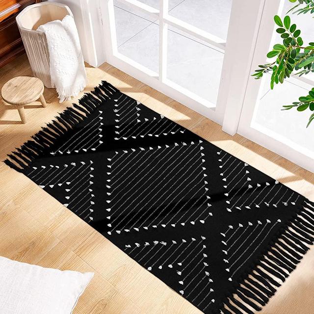 MitoVilla Black Boho Rug 2'x3', Black White Small Bathroom Rug with Tassel, Farmhouse Geometric Bath Mat, Bohemian Runner Rug for Bedroom, Washable Cotton Woven Hallway Laundry Entryway Throw Rug