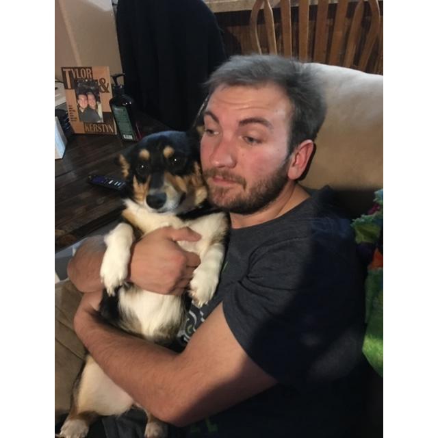 Tylor holding our Coco baby.