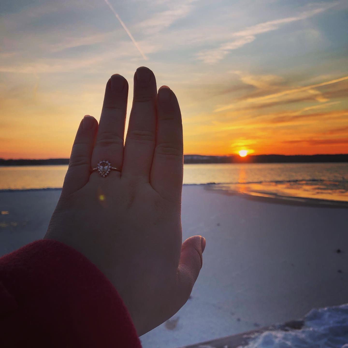 The sunrise right after proposed at the lake!