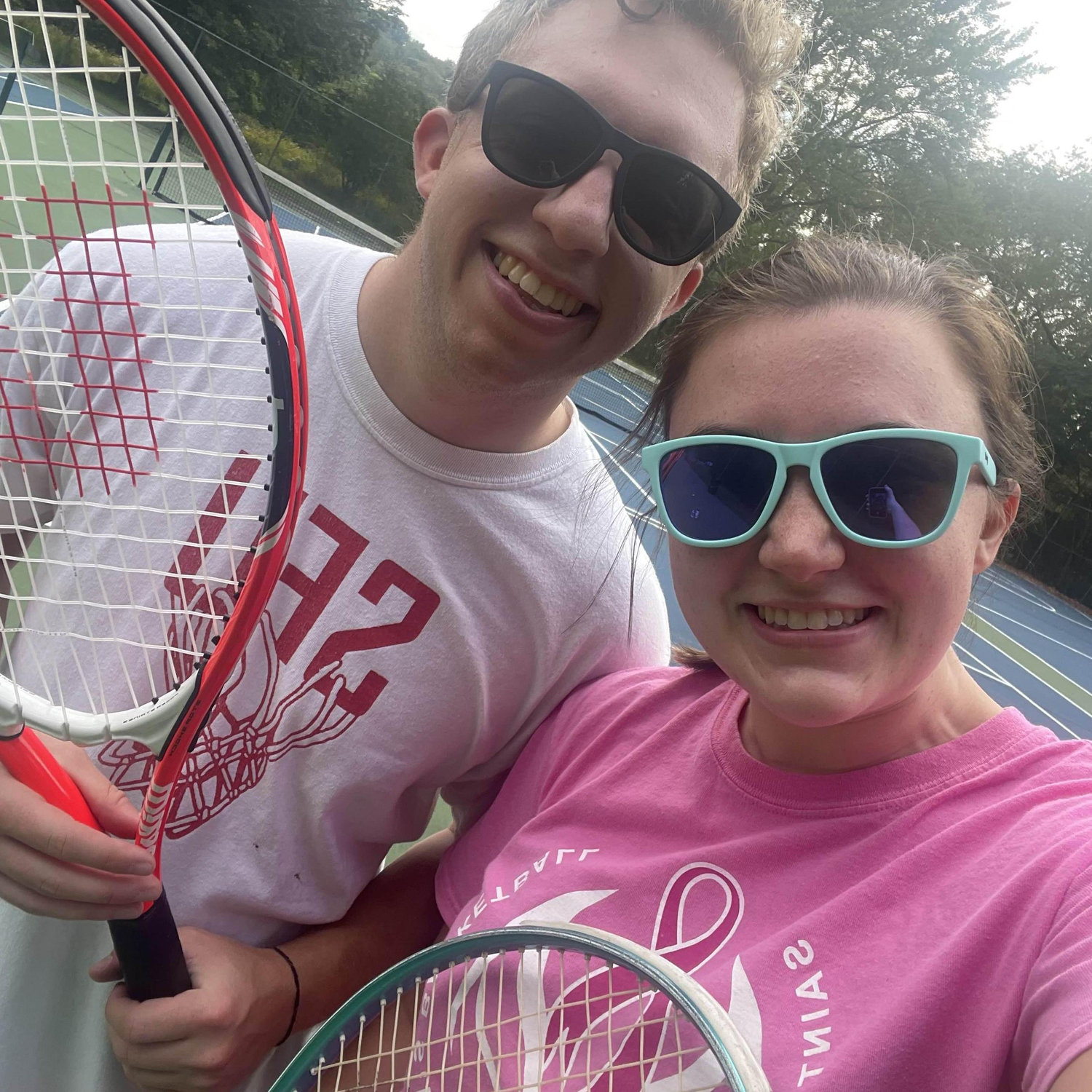Our first time playing tennis together! We have lots of practice before we can beat Lex's brothers and cousins
