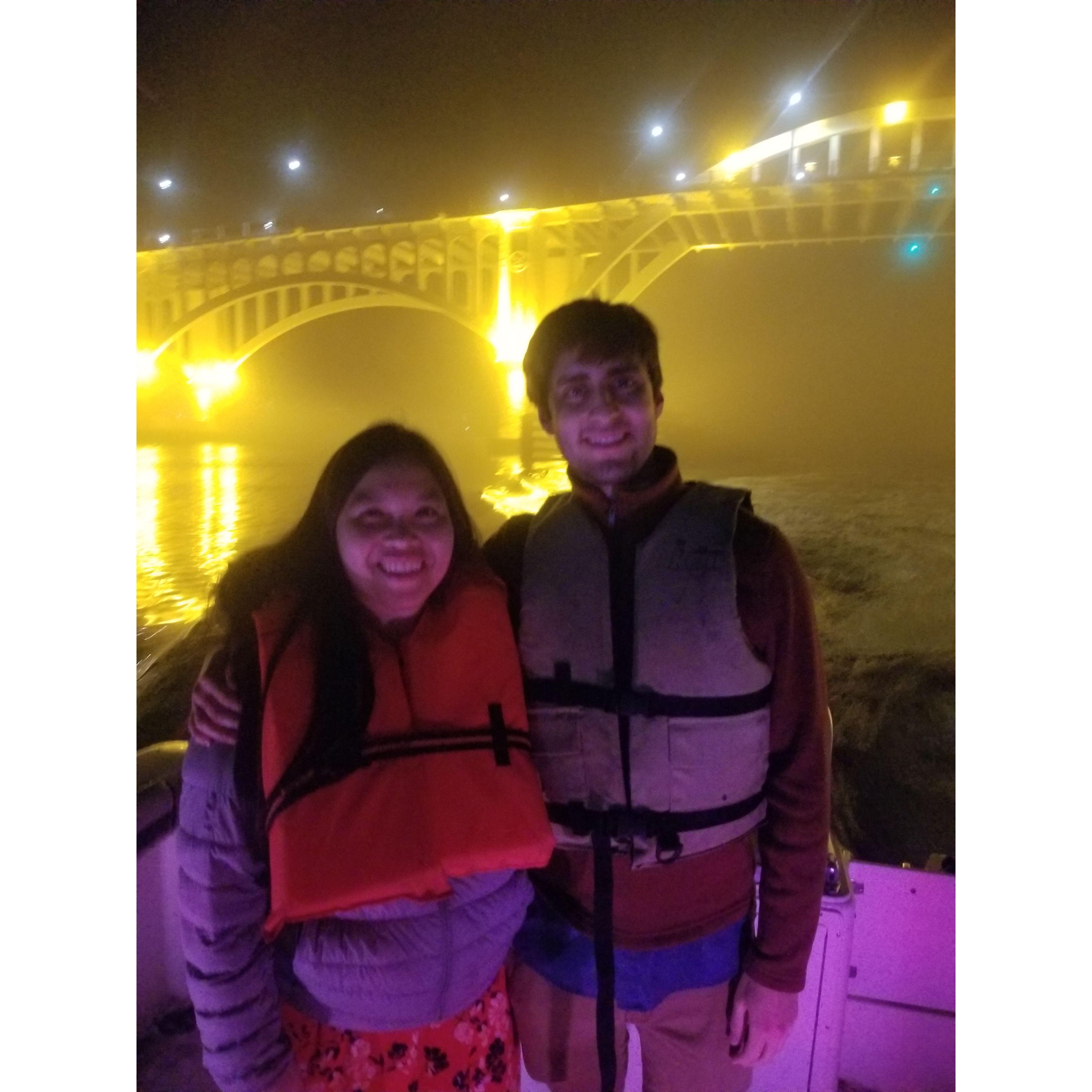 Josh and I on uncle Trung's boat at the bridge near Daytona river (2022)