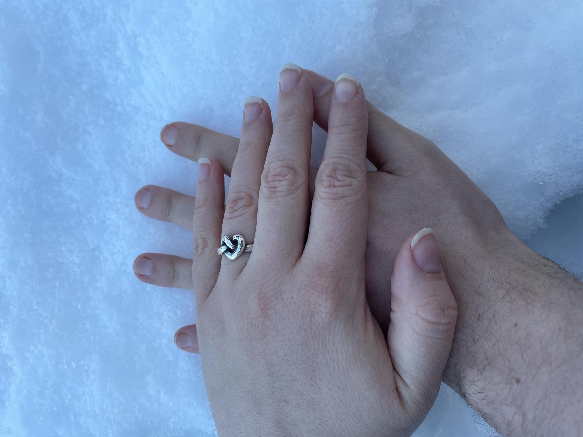 Engaged under the willow tree we had our first date, in the fresh snow after 2 years of dating.