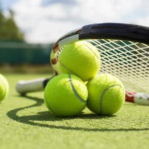 Tennis lesson on our honeymoon