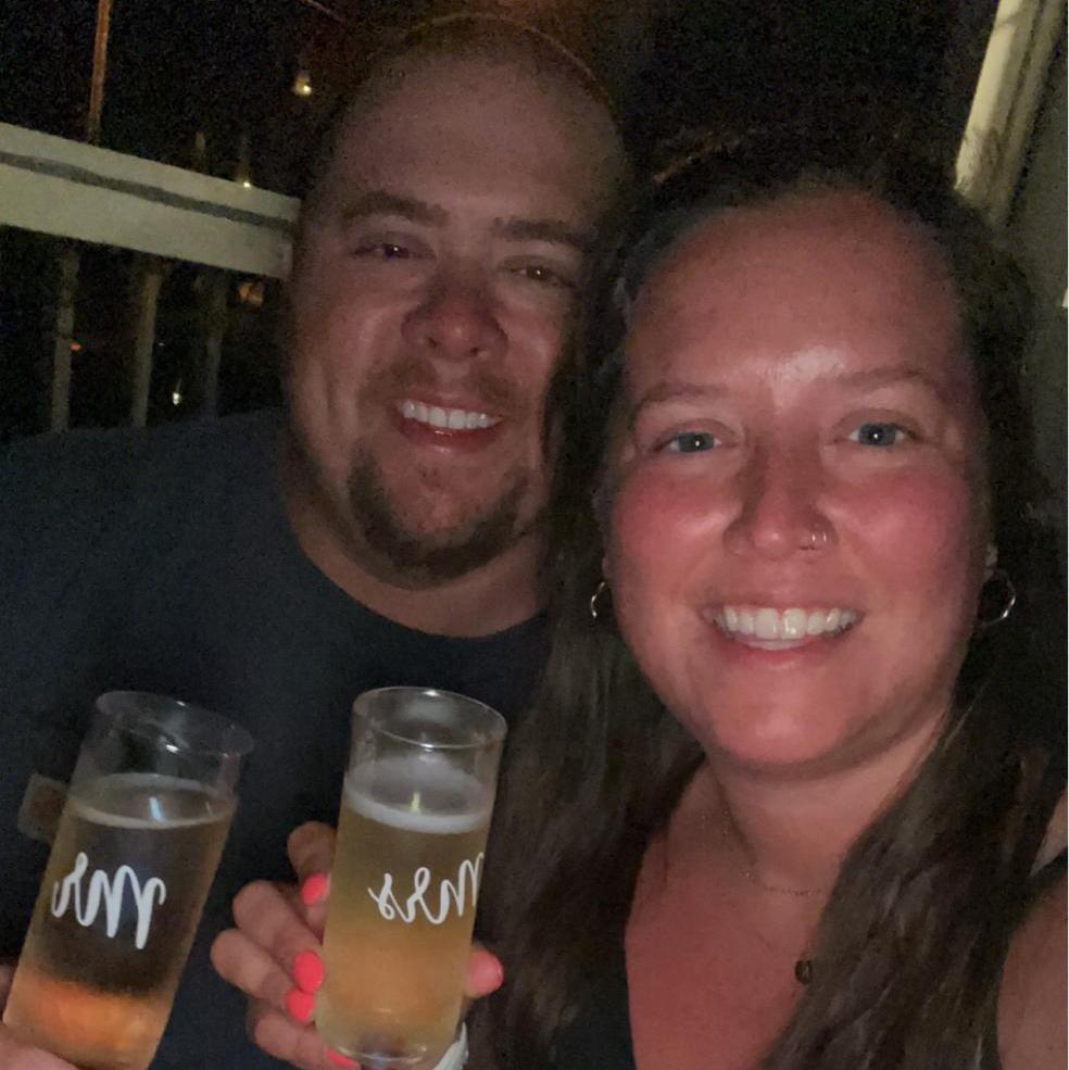 Glass of bubbly wine with our new Mr. and Mrs. glasses!