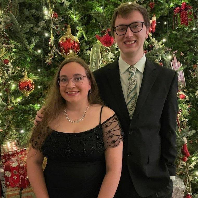 A nice picture of us in front of one of the Homestead Christmas trees.
