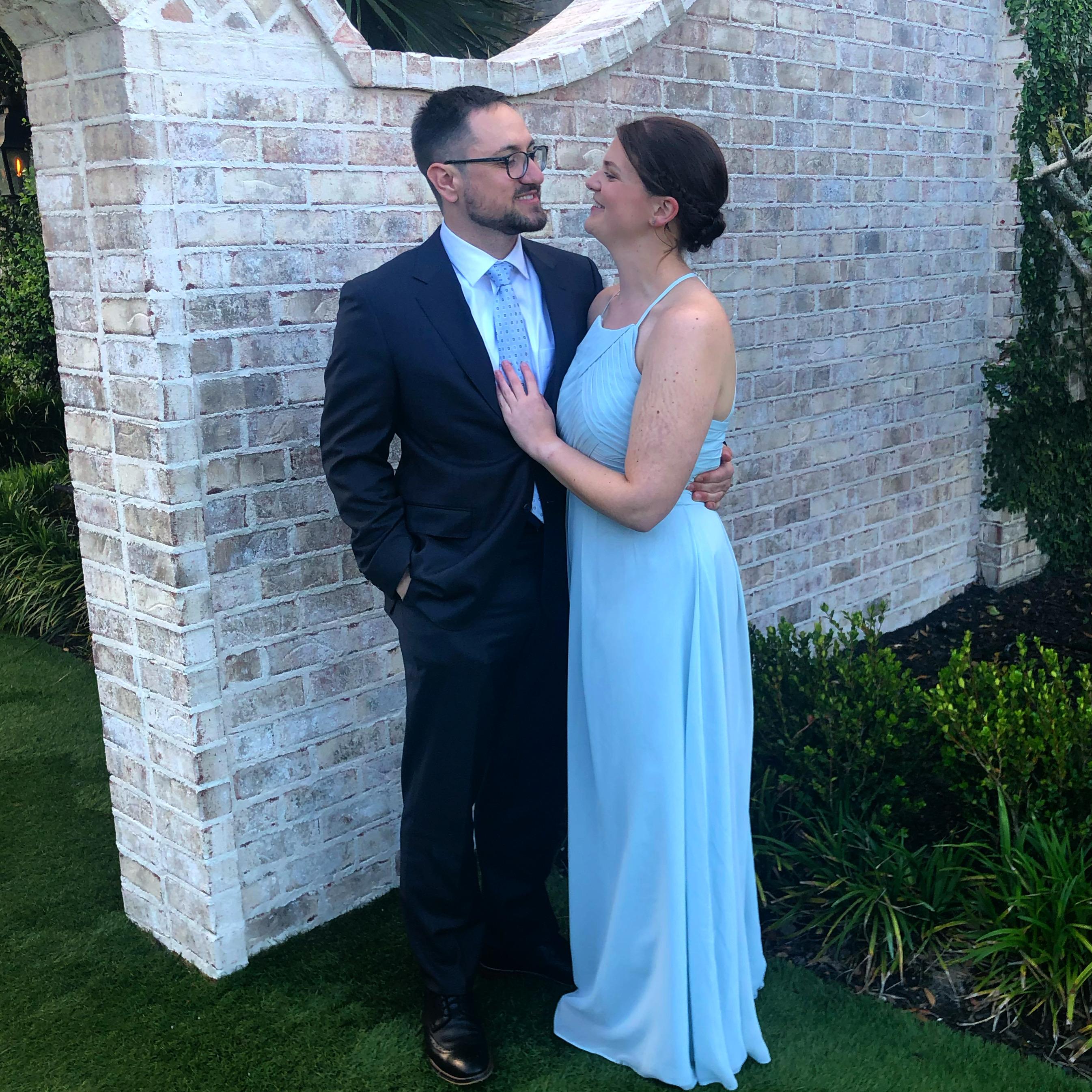 We have attended 4 weddings together! This photo was taken at Ashton's best friend's wedding!