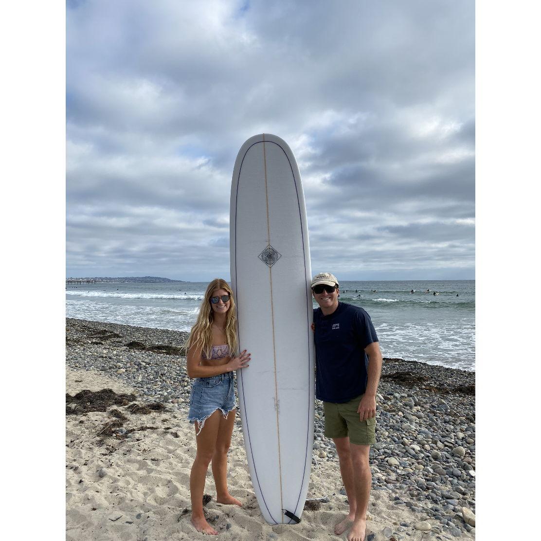 Chad surprised Claire with a longboard, her favorite hobby