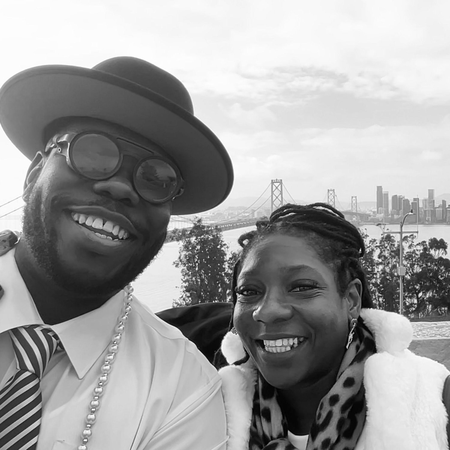 San Francisco in the background. Dope city, that taught us the Cali-Ways