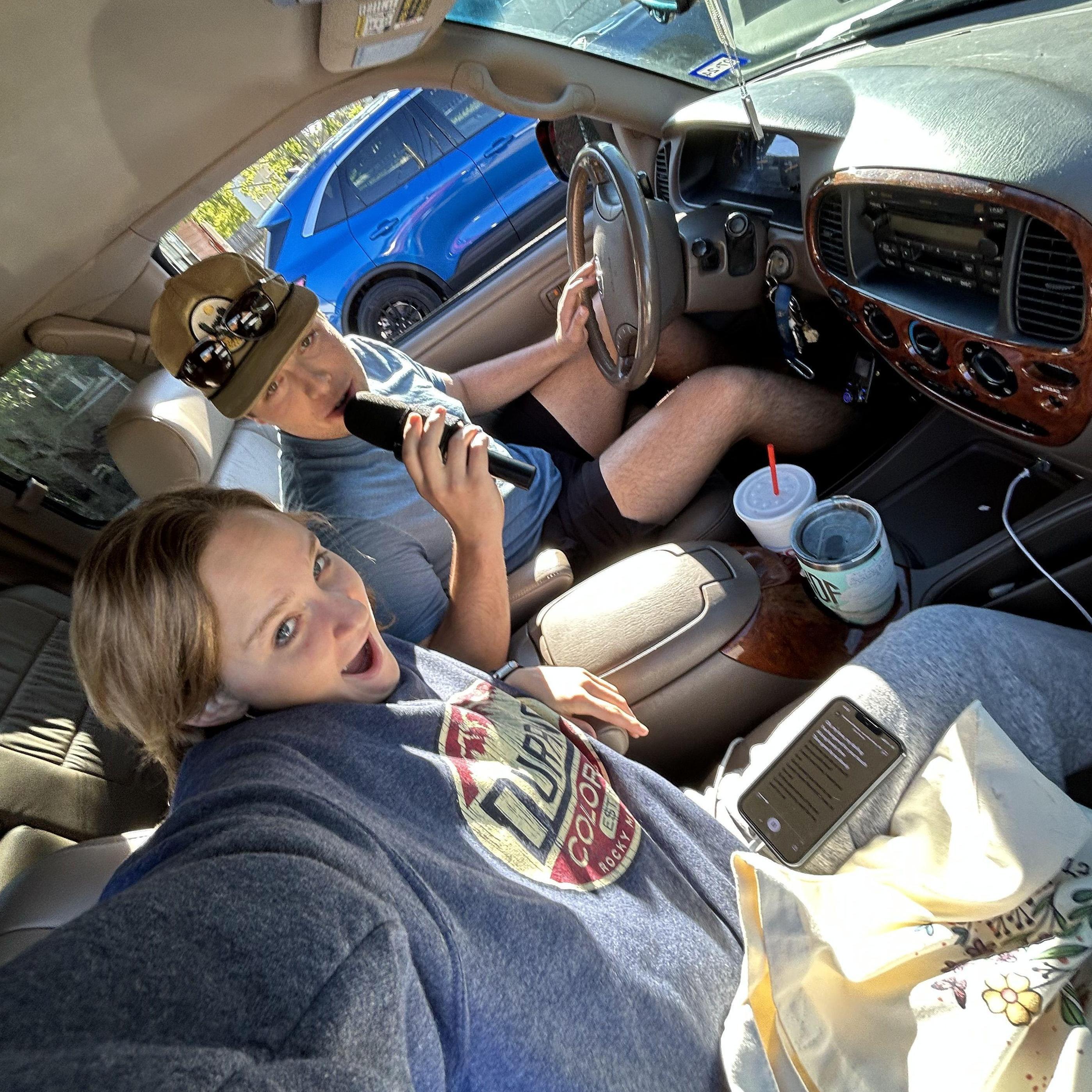 Ben serenading Kylee during car karaoke. She's a lucky gal.
