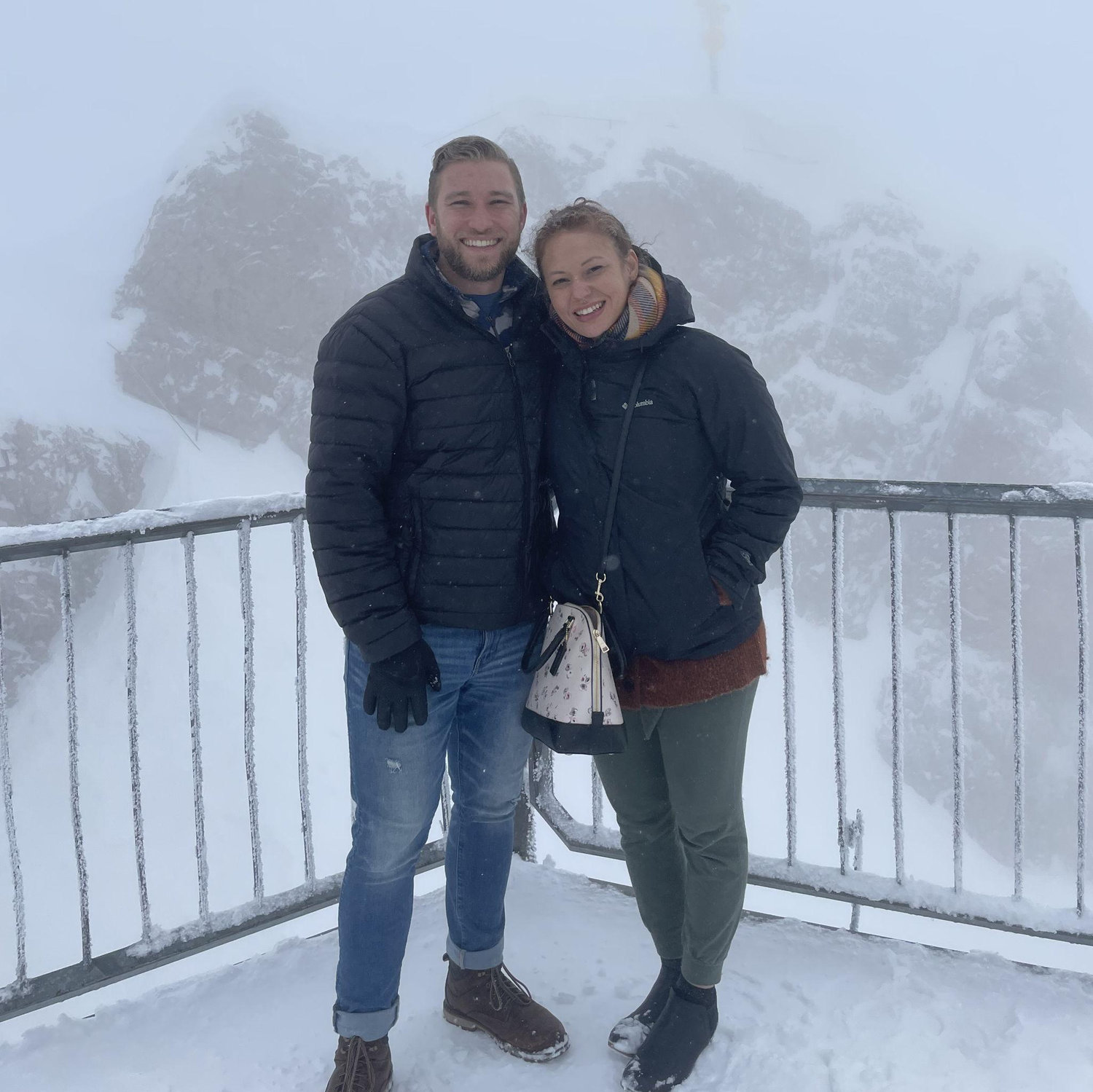On the top of the Zugspitze, Germany's highest peak, overlooking Germany, Austria, Italy, and Switzerland. We couldn't see anything except snow!