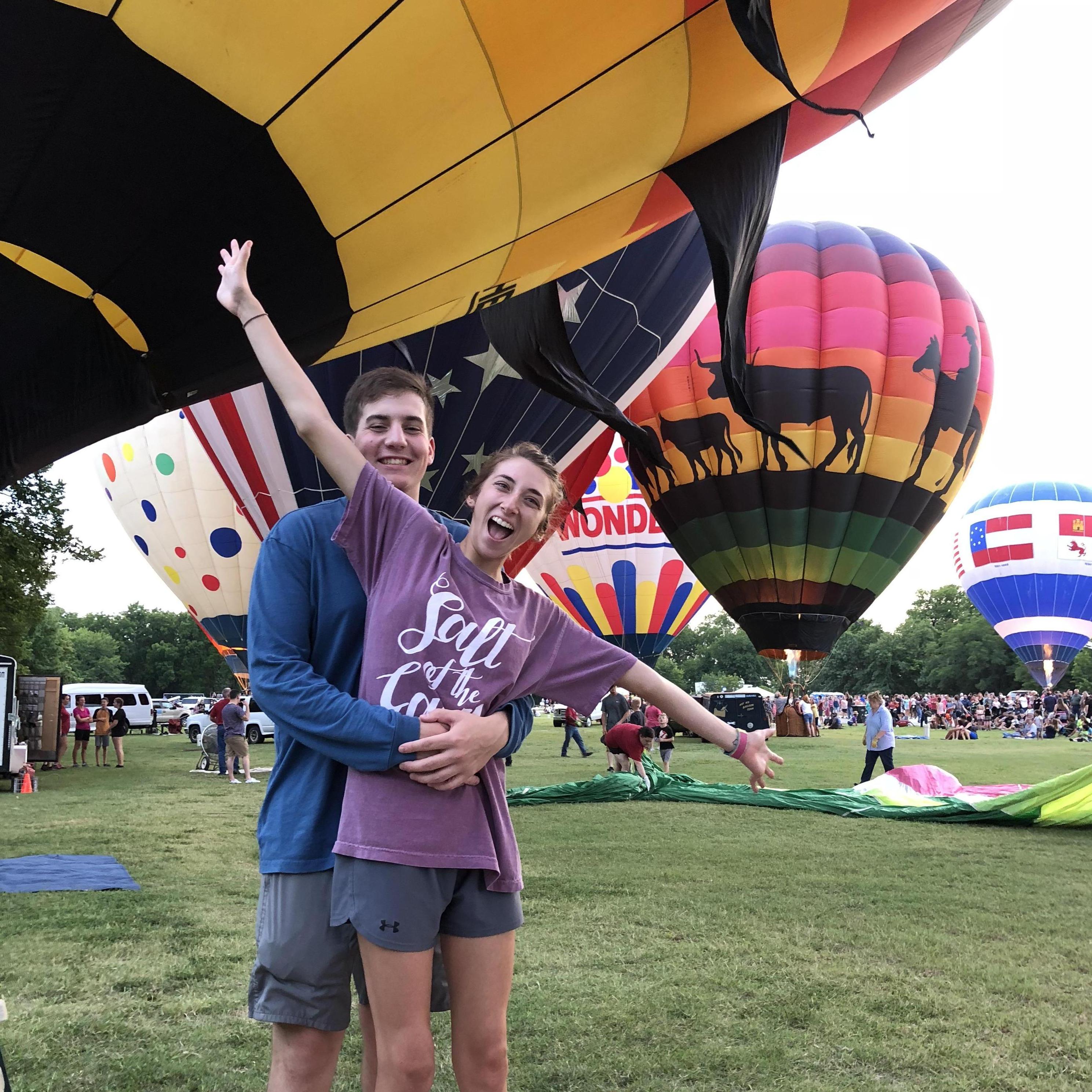Shawnee Hot Air Balloon Festival: we accidentally  sat on the side where the people who owned the balloons set them up so we ended up getting to get in one of them which was so cool! 8/11/18