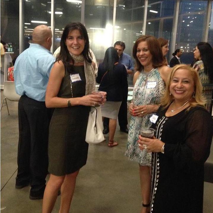 Claritza networking with the woman from Spain at the same spot Ragan will stand a few min later. . .