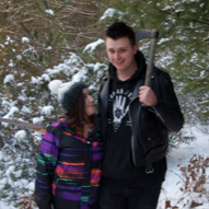 Cutting down our "Charlie Brown" Christmas tree in the woods in Erving, MA