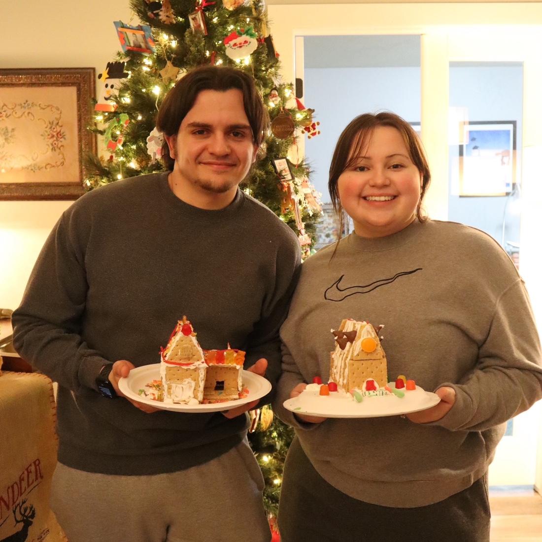 Our first Christmas together! You're looking at pro gingerbread house builders.