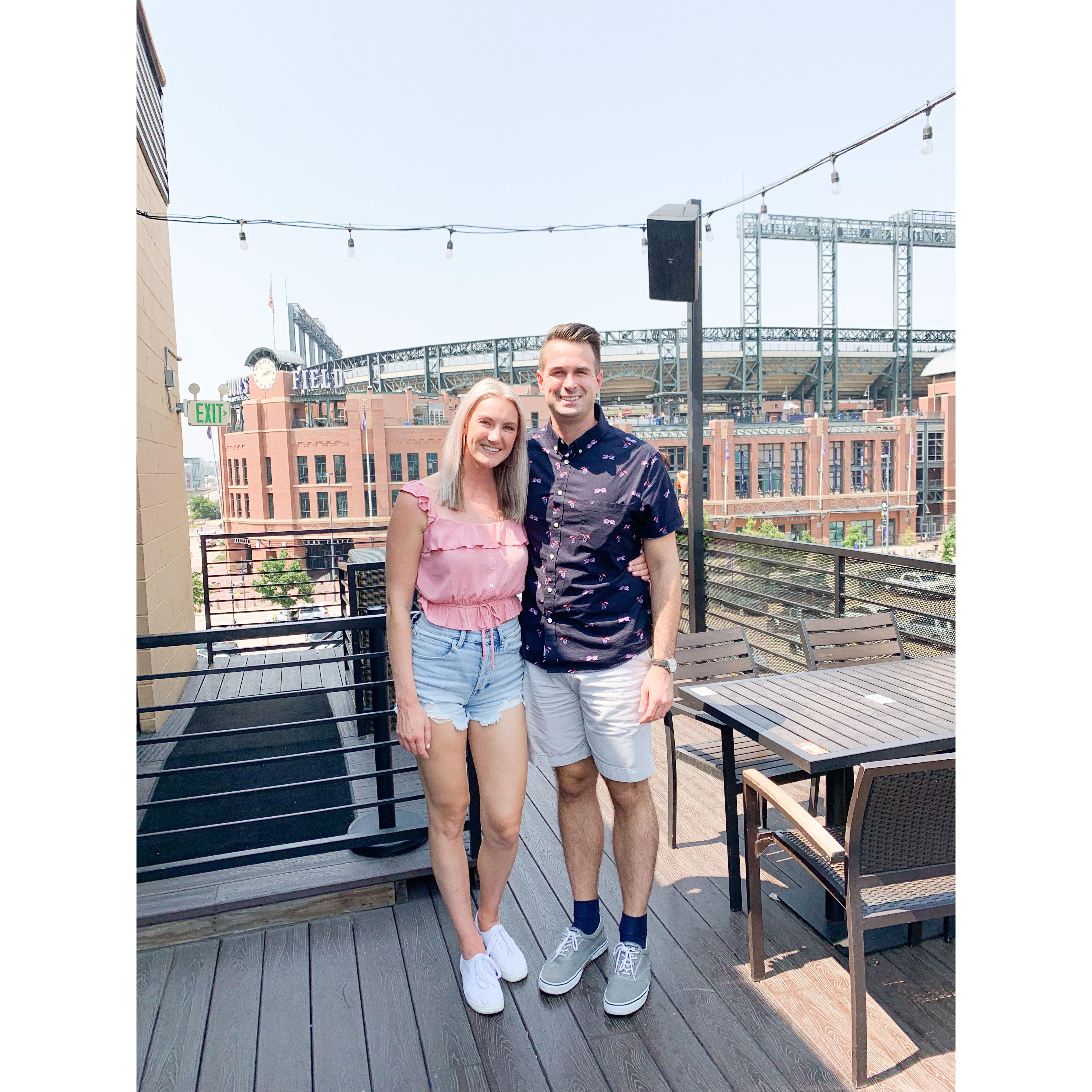 Visiting Denver and having drinks near Coors Field.