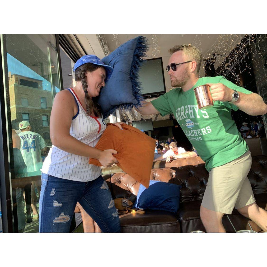 Just a casual pillow fight in the middle of a bar in Chicago