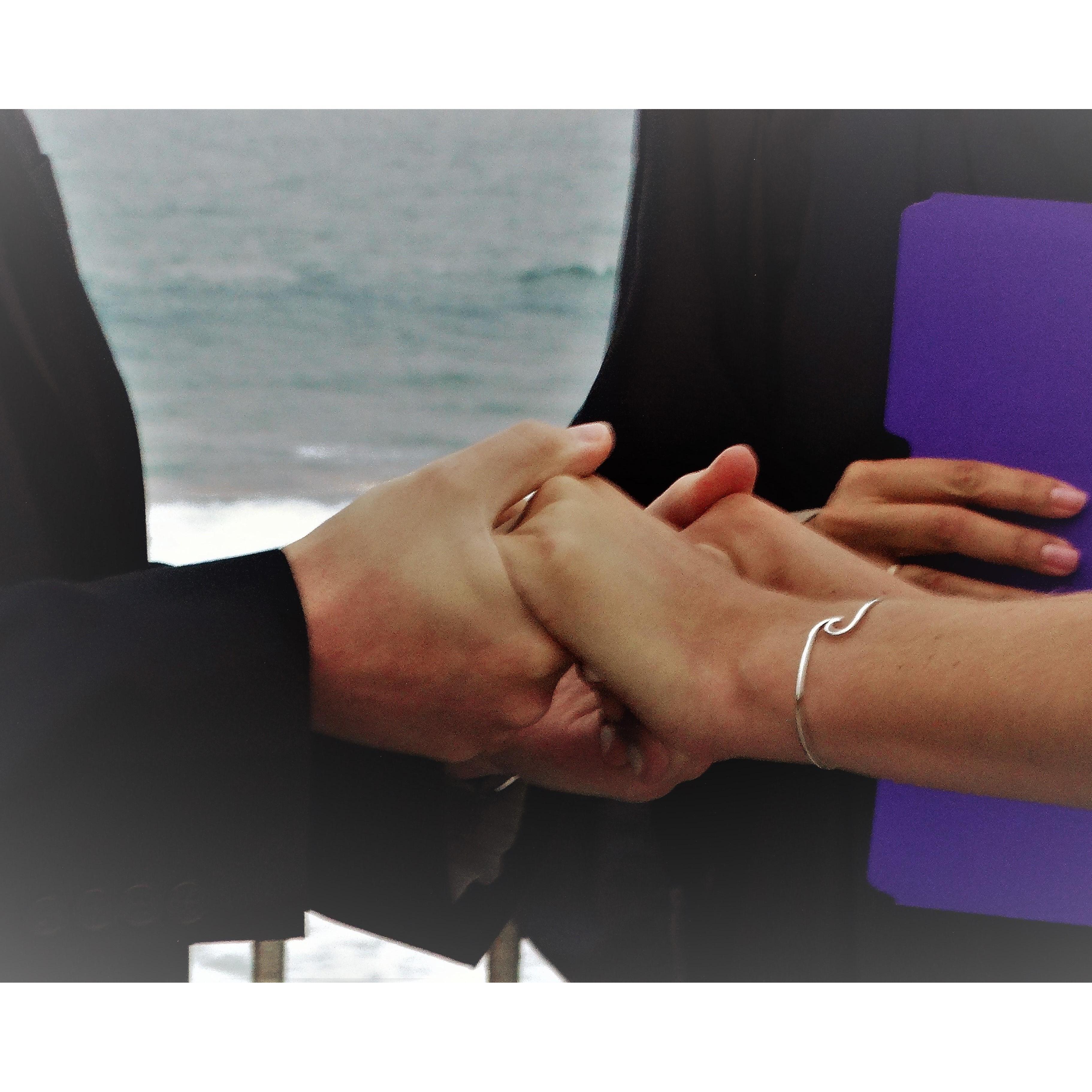 Holding hands :) getting ready to exchange silicone (all planned last minute) rings