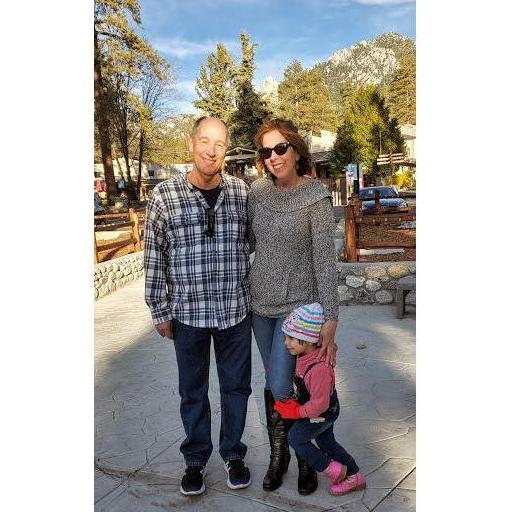 Our first photo together on our very first date! And no...we really don't know who this little girl is, lol. She fell in love with us and wanted to hug me and be in the photo with us!