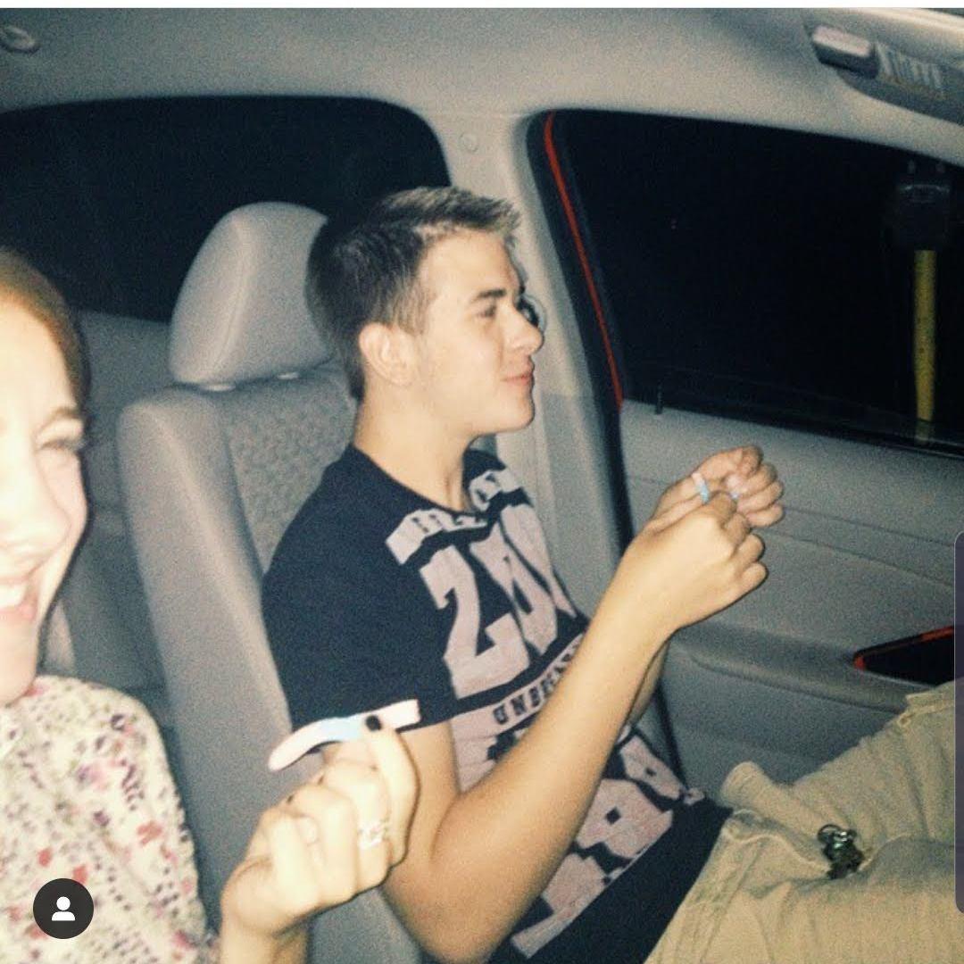 Our very first date and picture together. We decided to start dating shortly after this photo was taken at Kane Road Drive-In!
