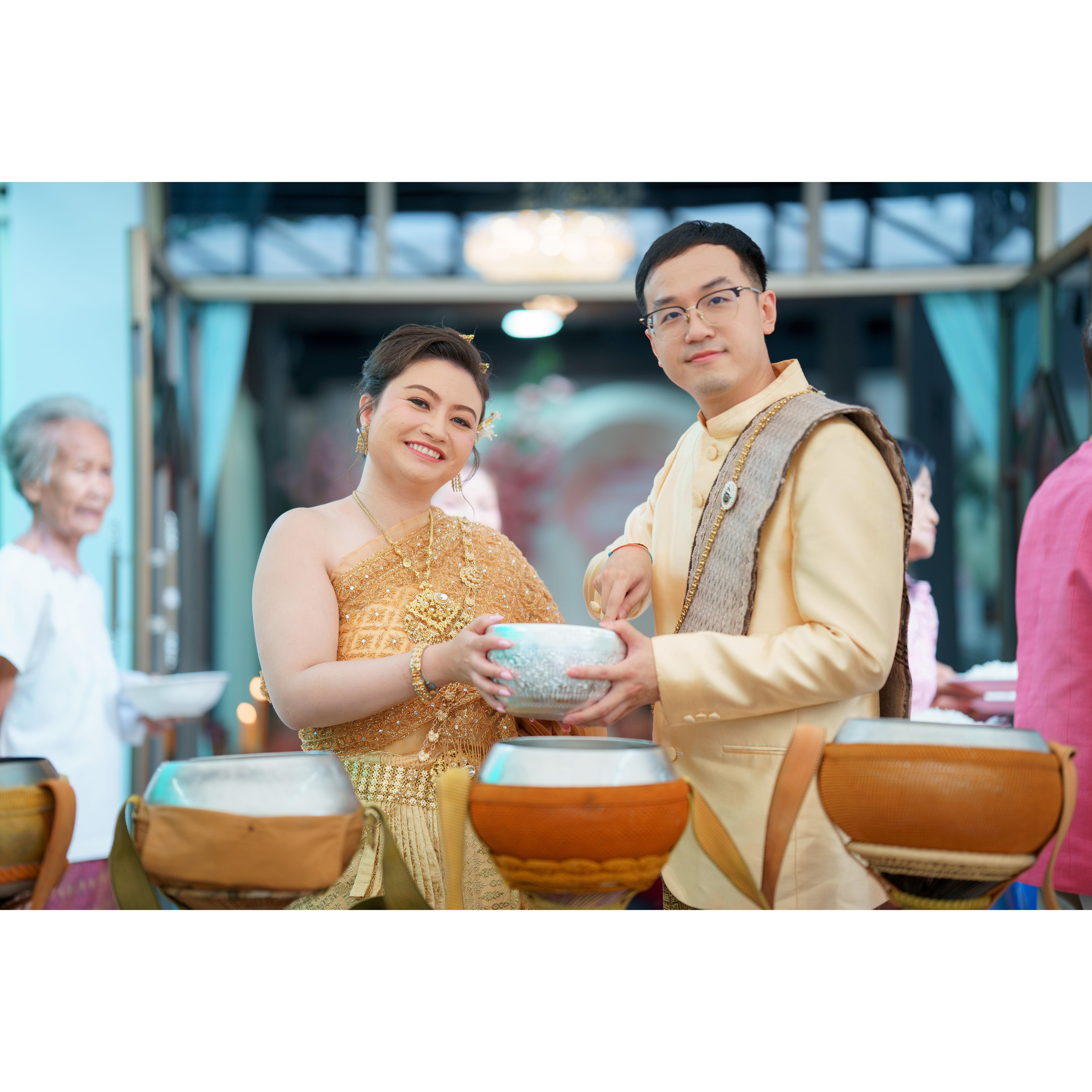 May 27, 2568 - During our Thai wedding, we gave offerings to the monks. This is us scooping rice in each individual monk's bowl.