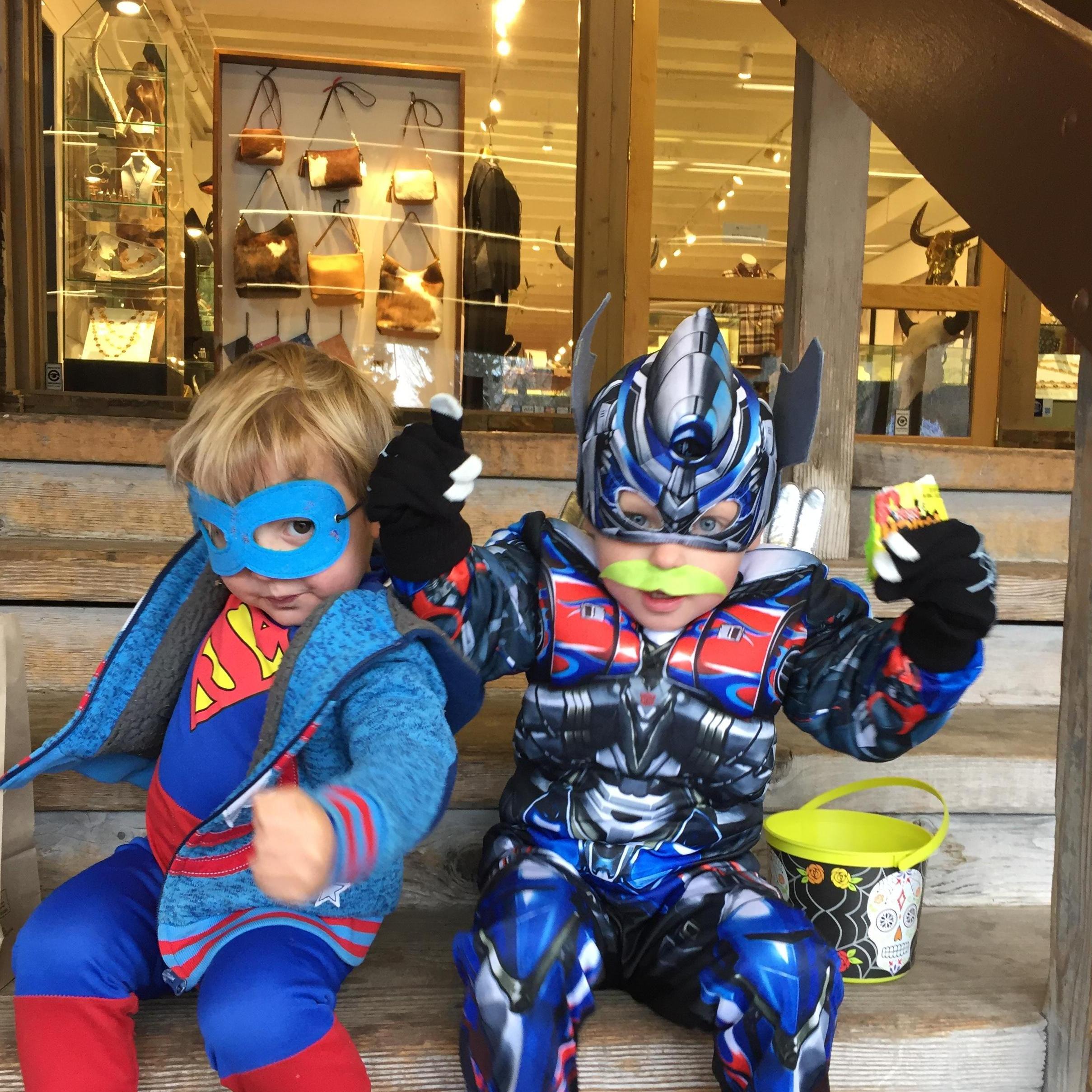 Cache and Pax town square trick or treating together