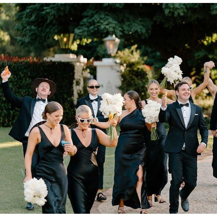 A black-tie celebration with personality – elegant dresses and tuxedos that make every moment unforgettable.