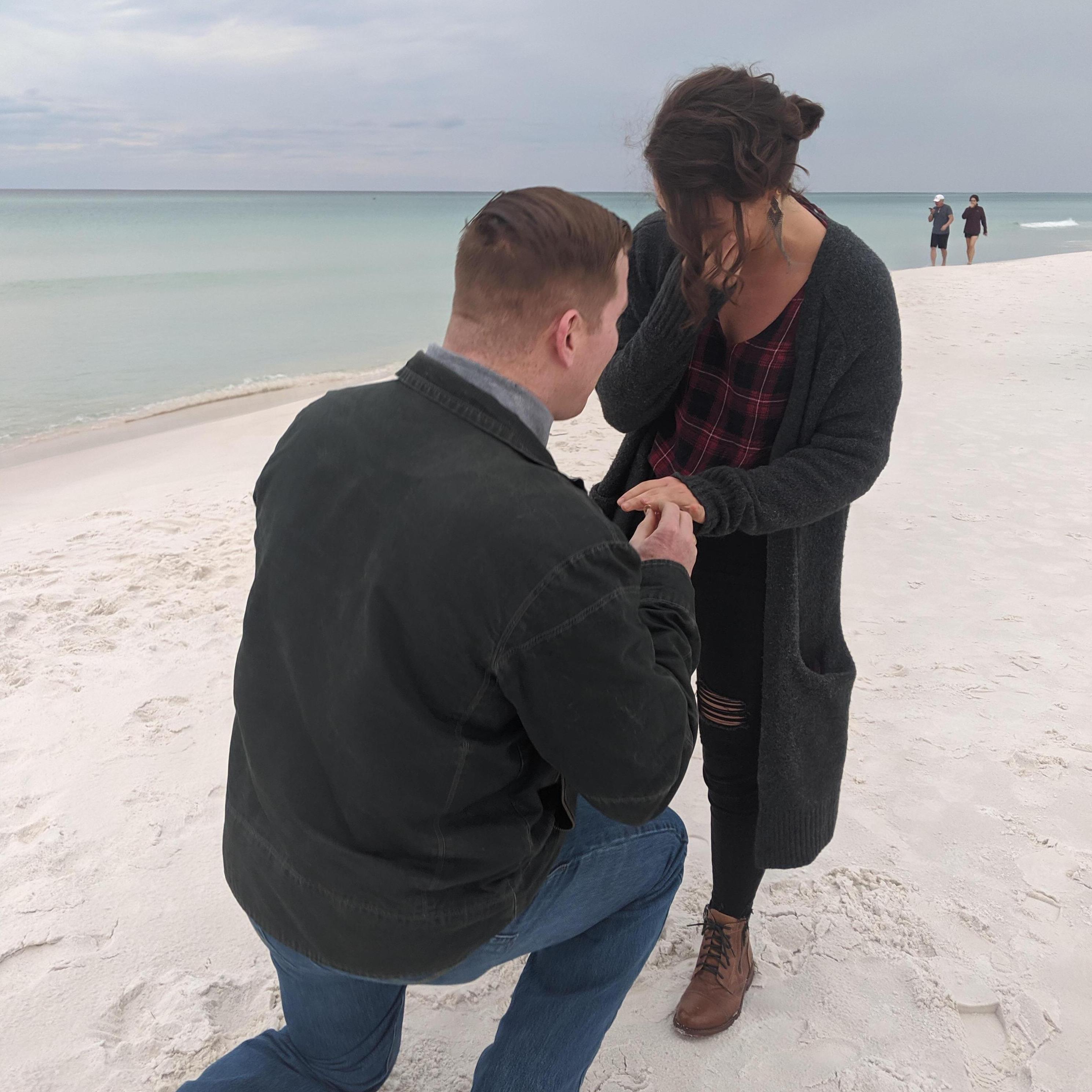 All I can say is, "BOUT TIME!" Kidding. Stuart planned a beautiful proposal on my favorite beach with my very best friends. (: