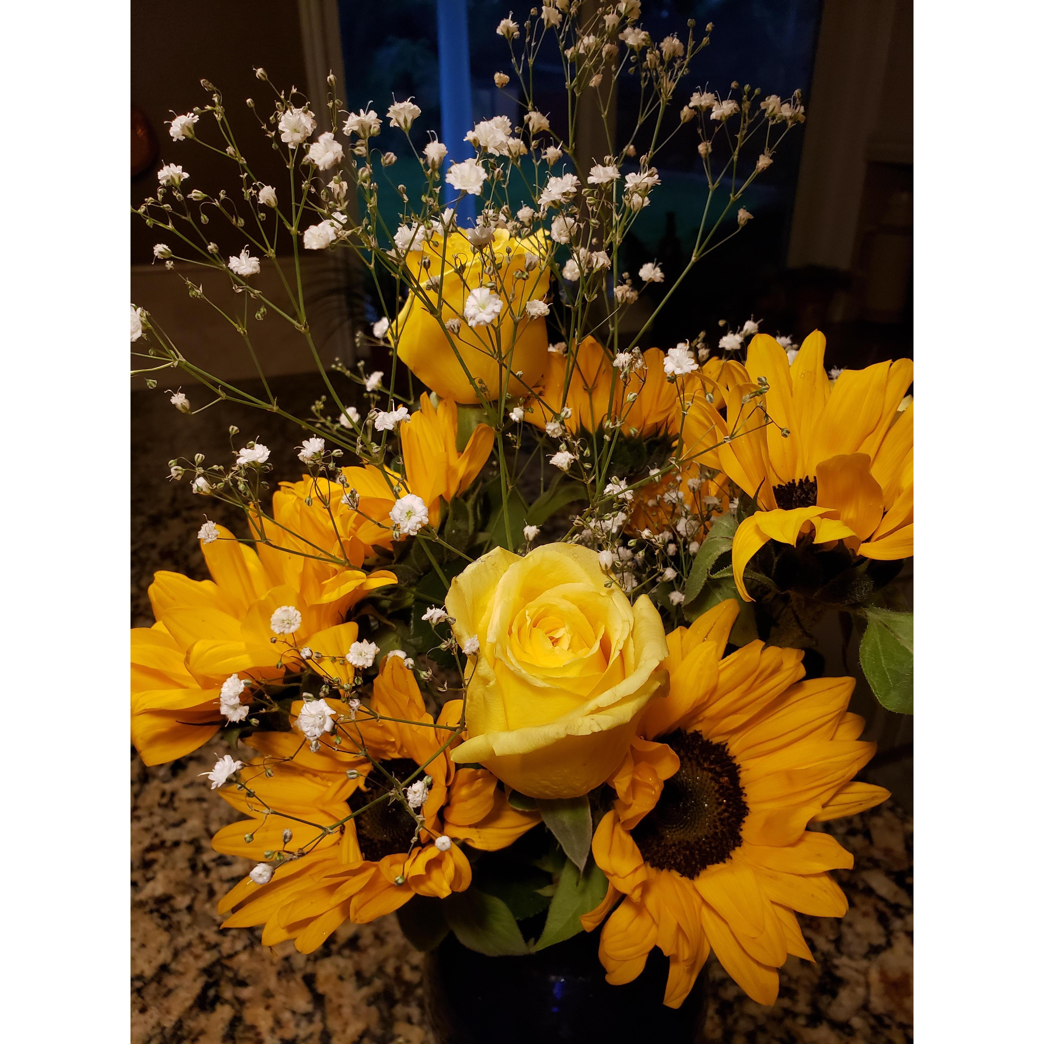 The first flowers he gave me after a harrowing night of overcoming obstacles to come see me. From missing trains, to broken down cars, and waking up friends to drive half the night, he made our date.
