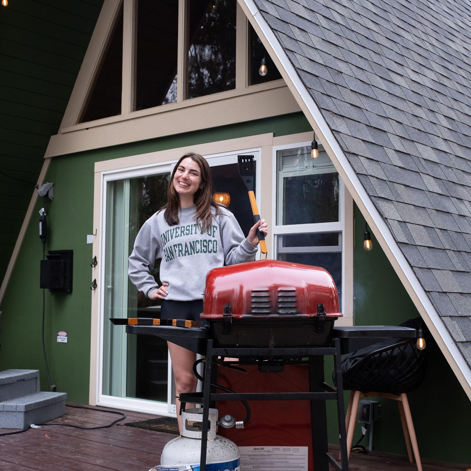 Sarah grilling on their first trip together- San Luis Obispo on the 4th of July, 2023.