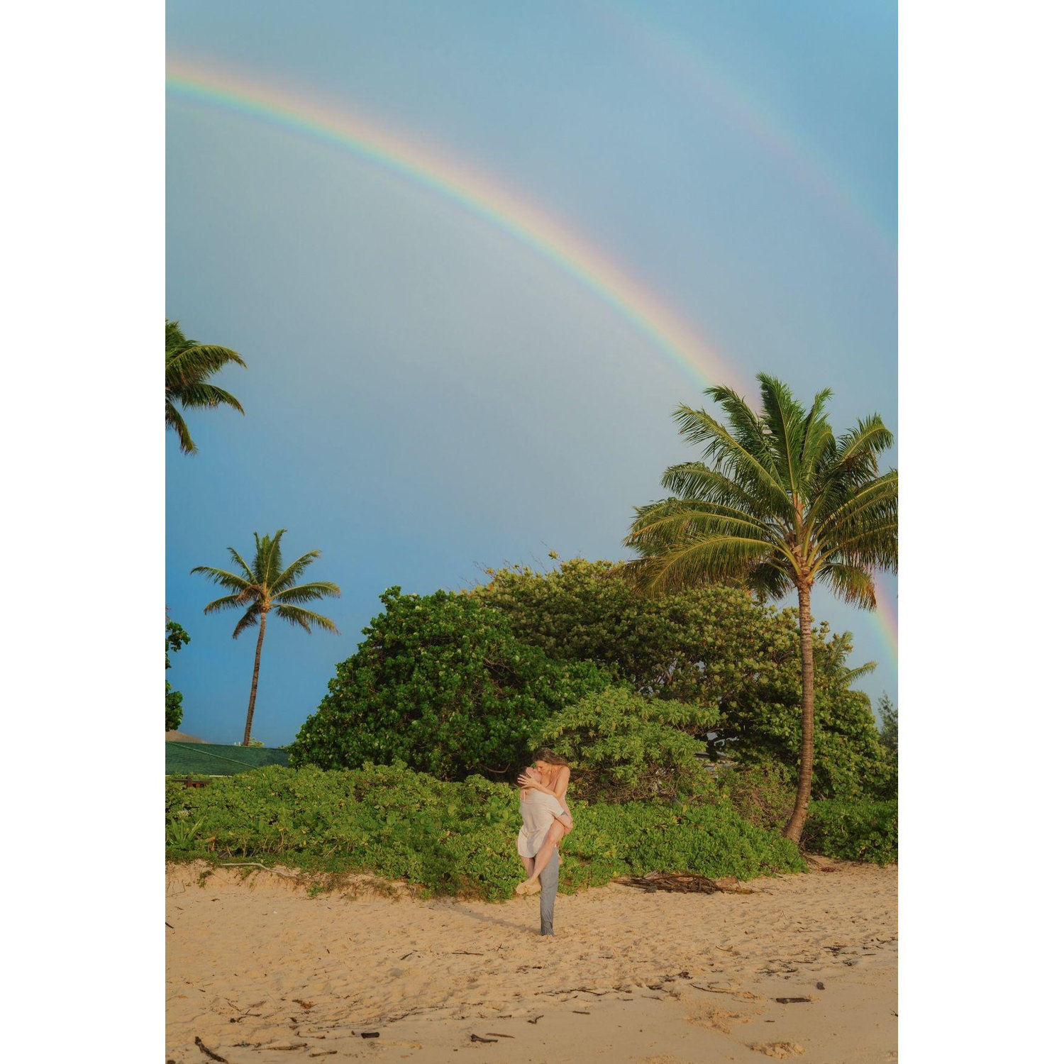 5/6/25, the day of our sunrise engagement photo shoot at Lanikai. It started raining for a brief moment and then suddenly a double rainbow stretched across the sky. The island was blessing our love :)