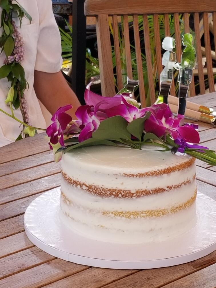 Naked Lilikoi cake with custom cake topper