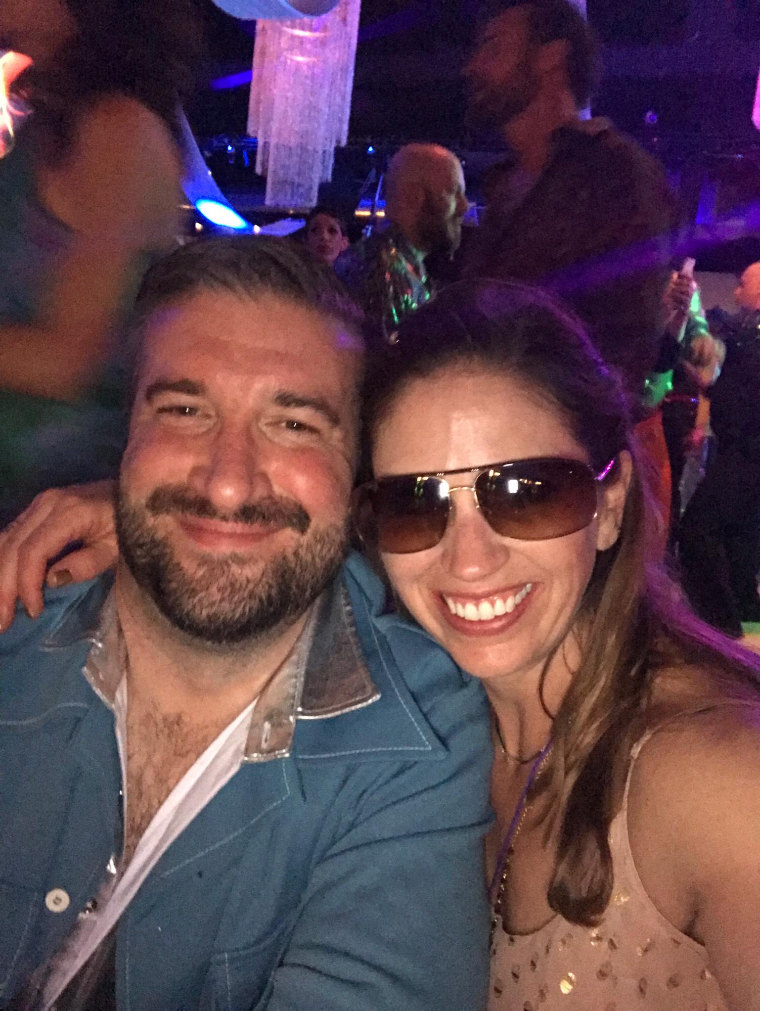 We love to dress up! This is us at the ISD Gala 70's themed. I wish Jesse's shoes were in the picture. The blue suede suit was awesome.