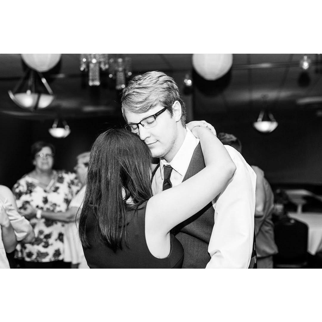 This was snapped at a friends wedding and when I saw the way he was looking at me I knew he was the one.